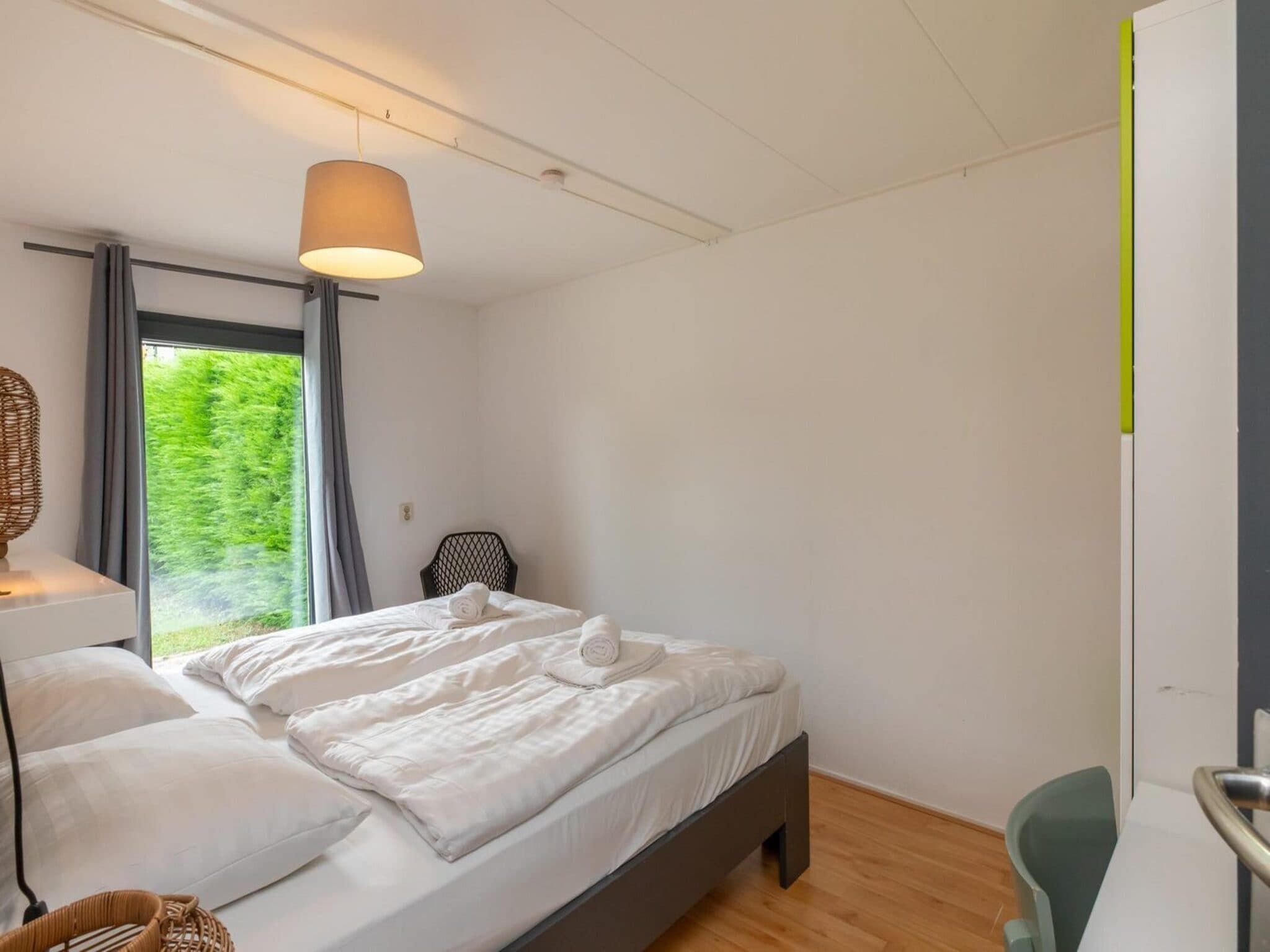 Een slaapkamer van Strandhuis Schoneveld in Breskens