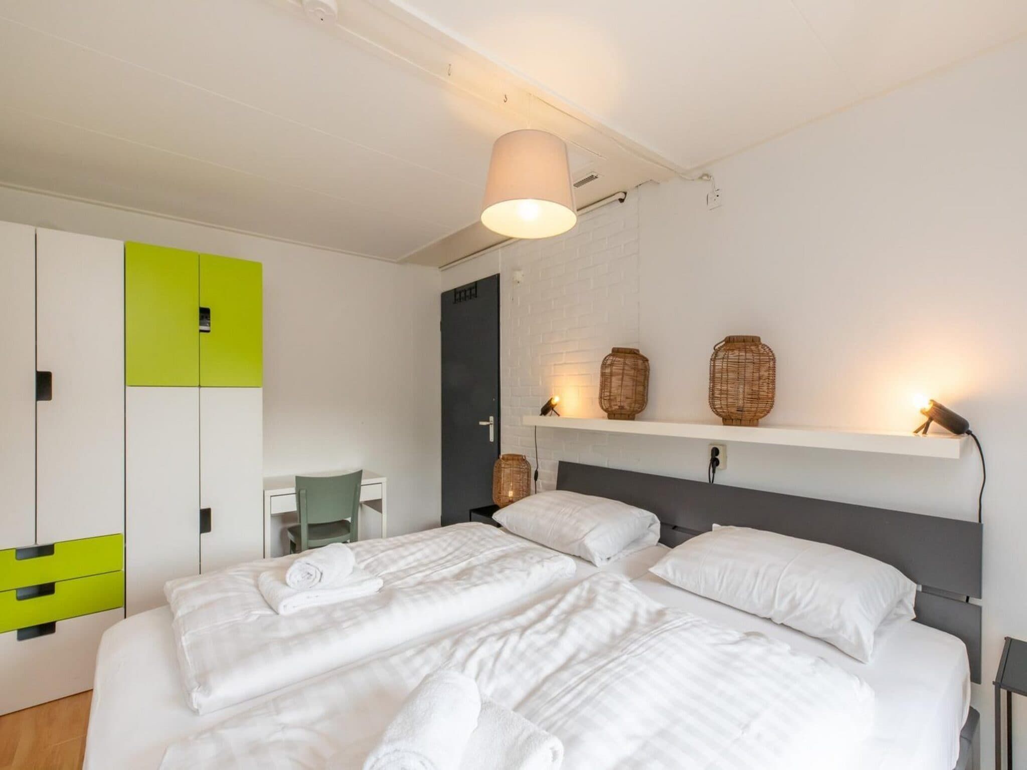 Een slaapkamer van Strandhuis Schoneveld in Breskens