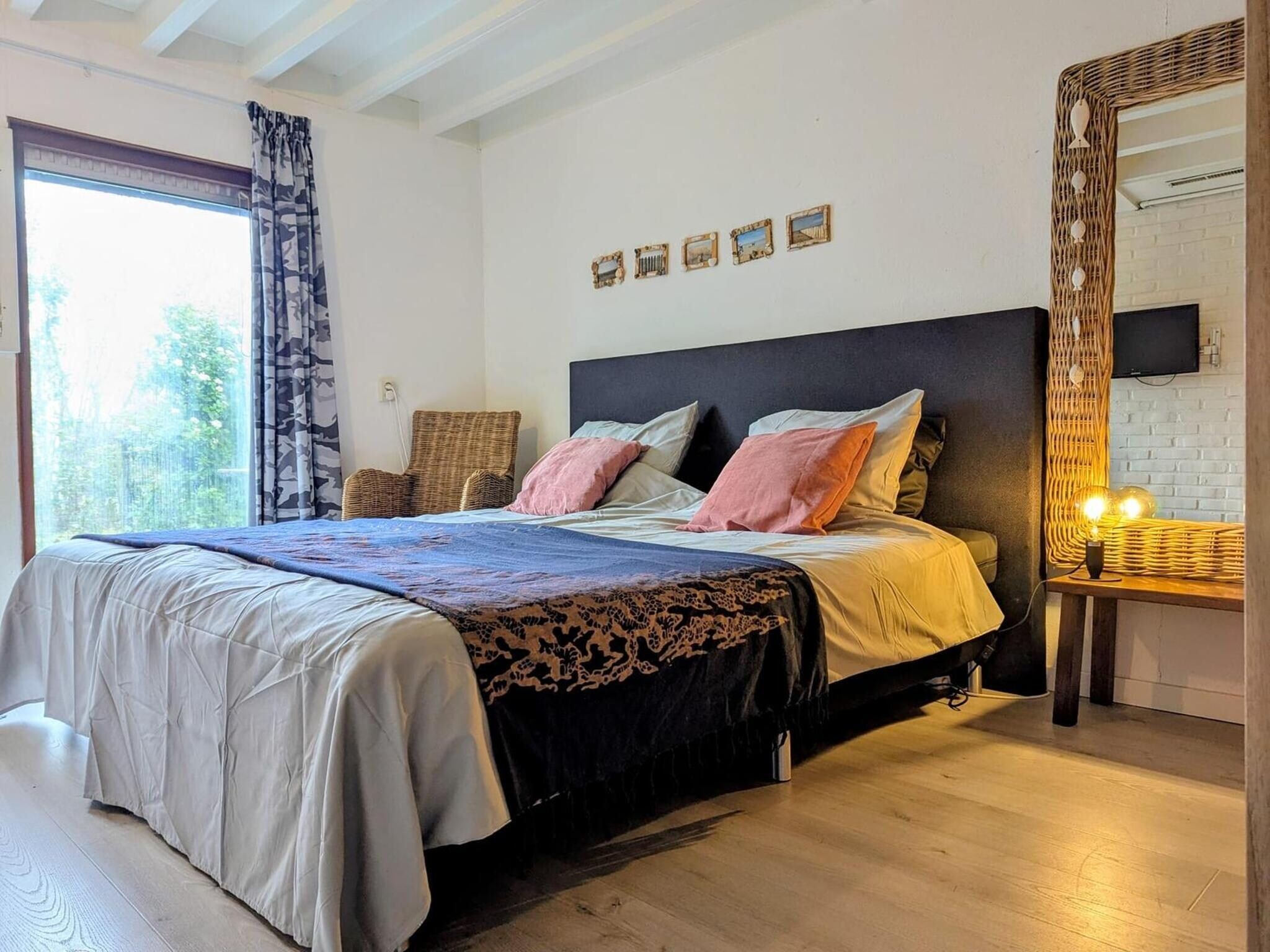 Een slaapkamer van Schoneveld 11 Zeester Breskens in Breskens