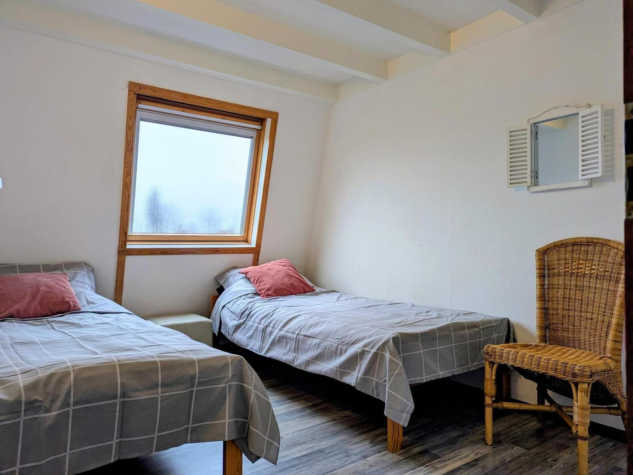Een slaapkamer van Schoneveld 11 Zeester Breskens in Breskens