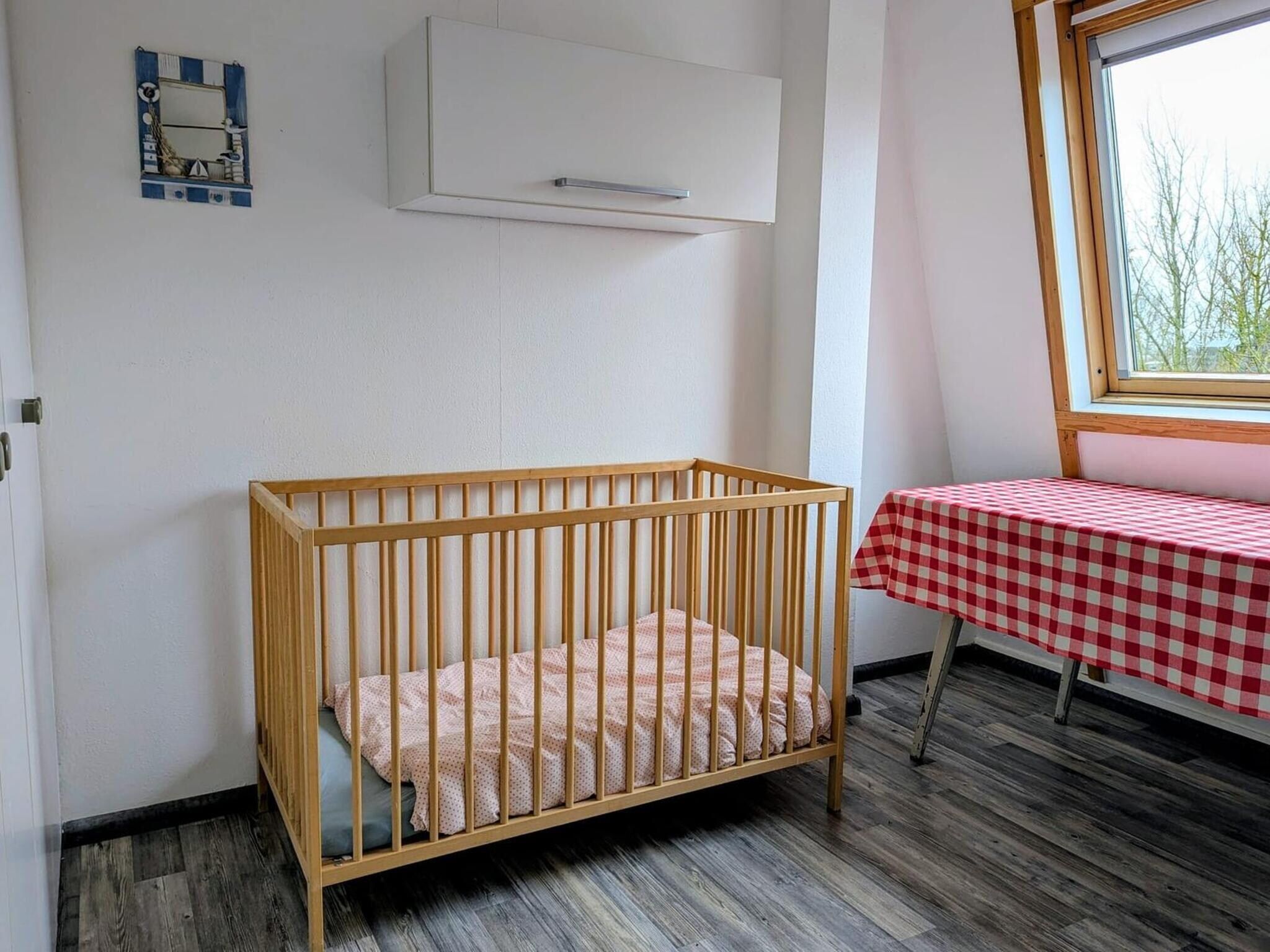 Een slaapkamer van Schoneveld 11 Zeester Breskens in Breskens