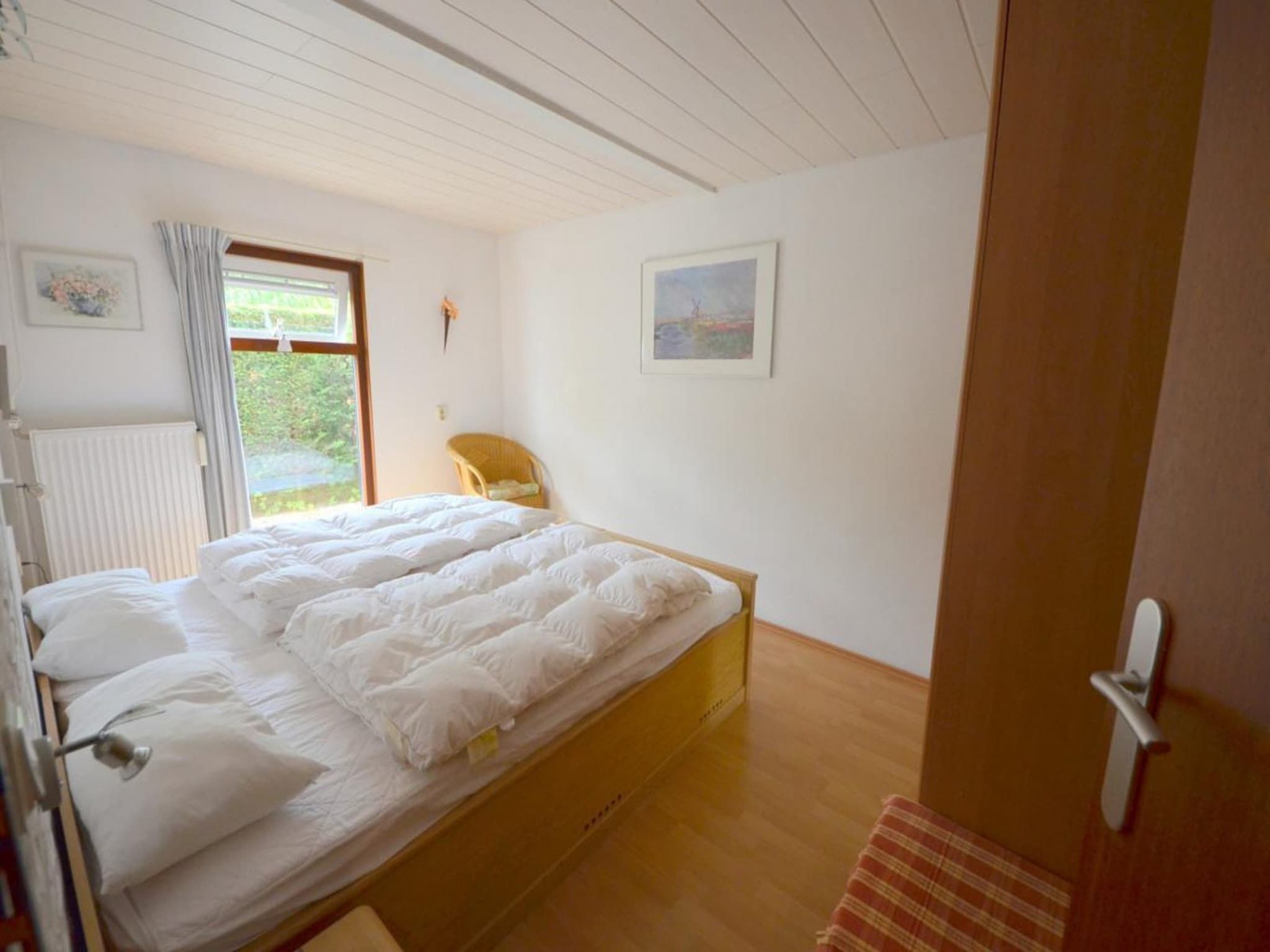 Een slaapkamer van Schoneveld 35 Zeester Breskens in Breskens