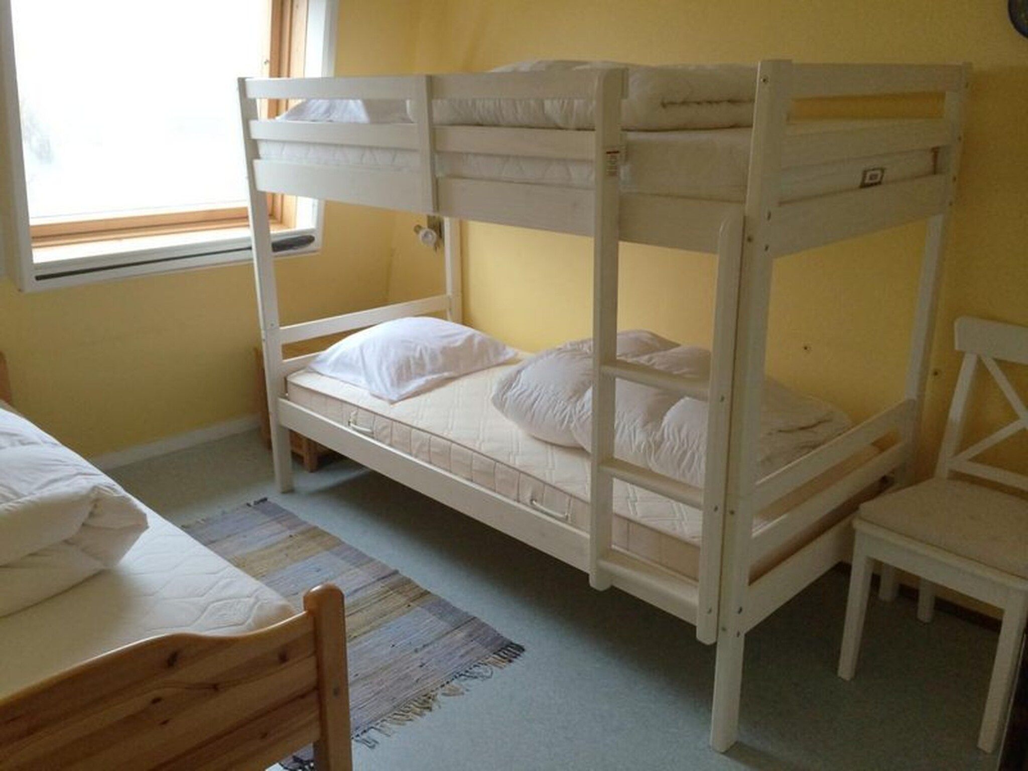 Een slaapkamer van Schoneveld 35 Zeester Breskens in Breskens