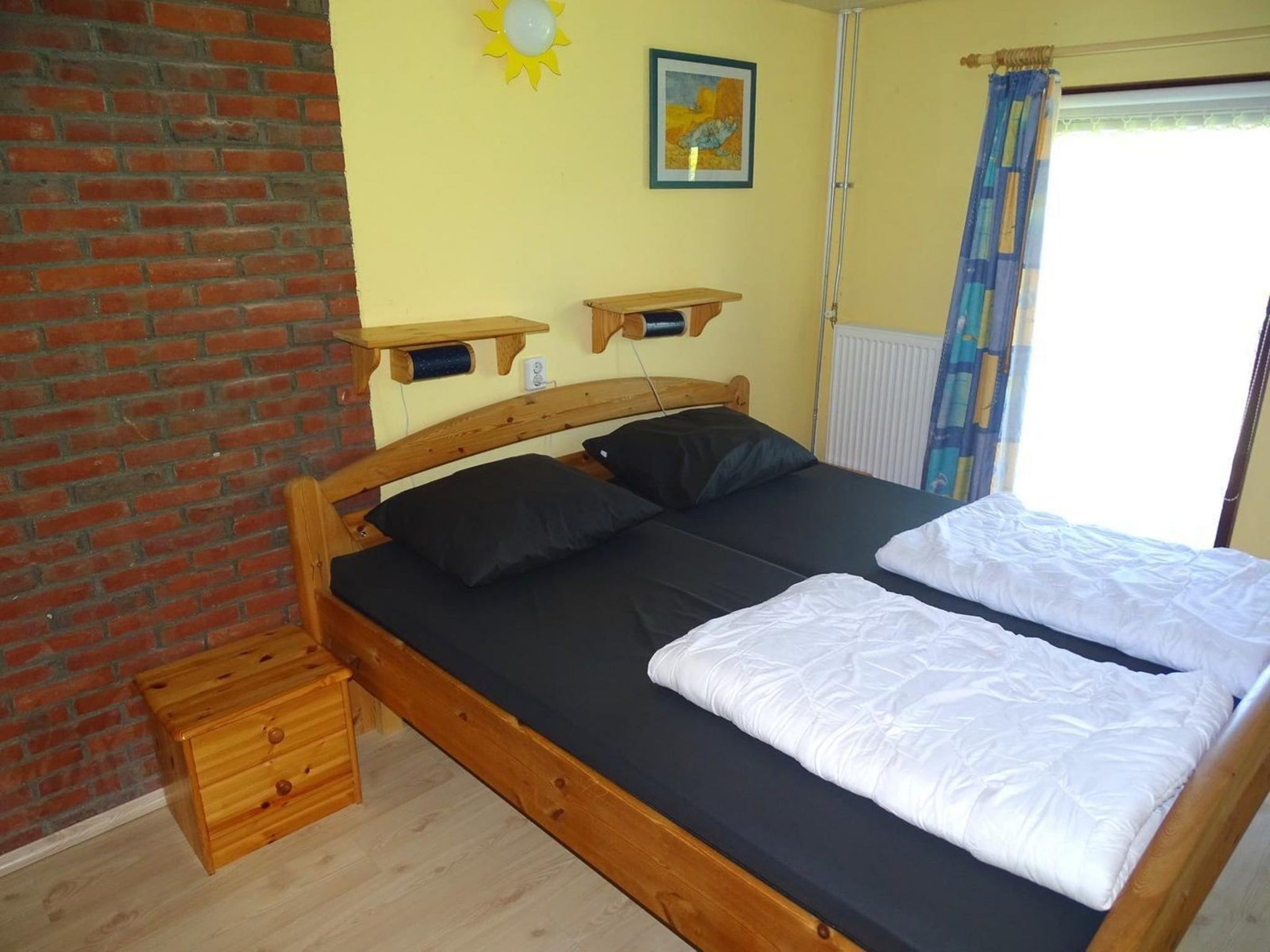 Een slaapkamer van Schoneveld 36 Zeester Breskens in Breskens
