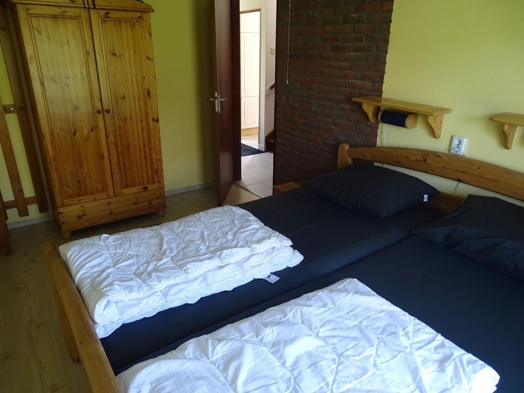 Een slaapkamer van Schoneveld 36 Zeester Breskens in Breskens