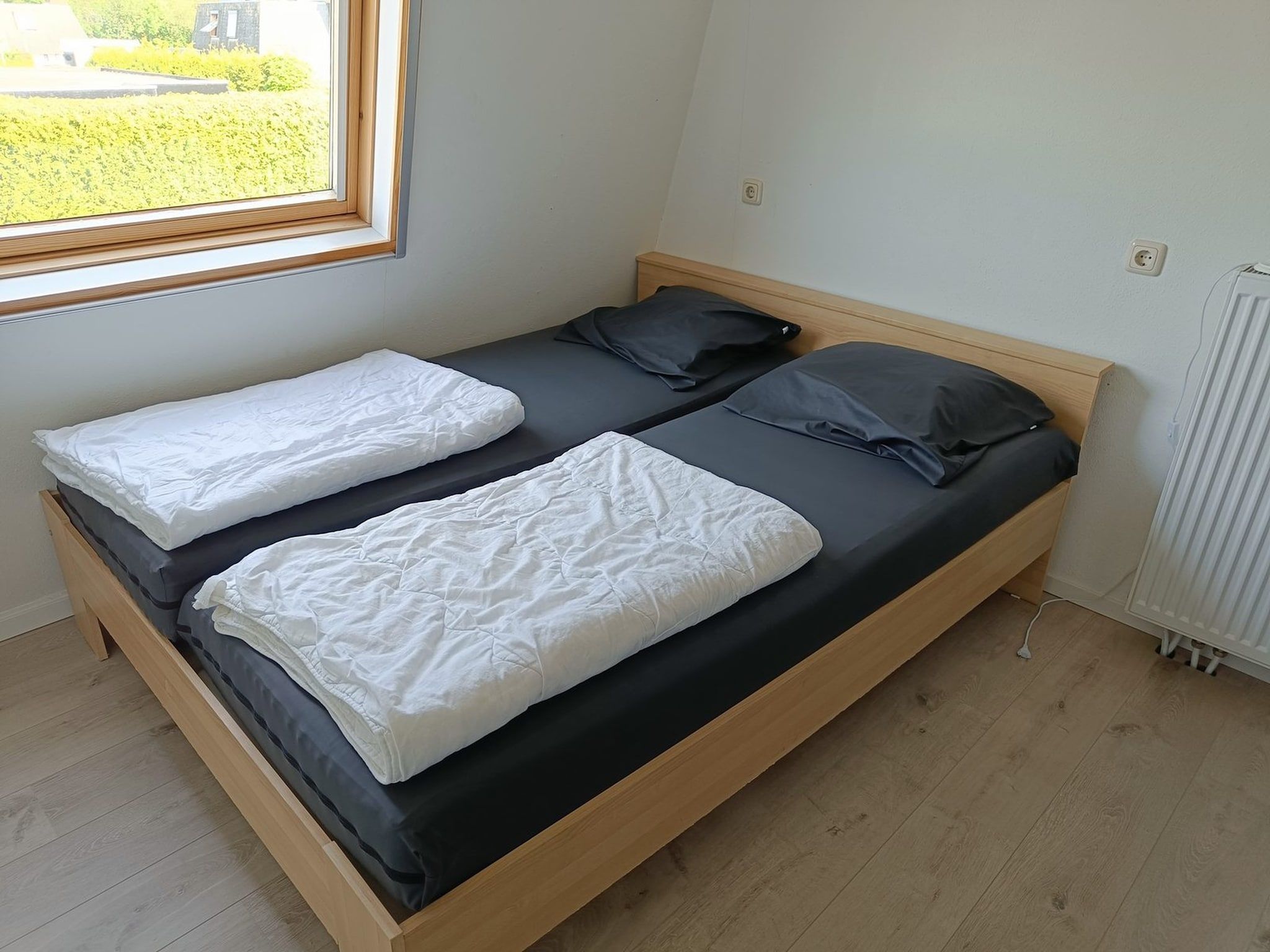 Een slaapkamer van Schoneveld 39 Zeester Breskens in Breskens