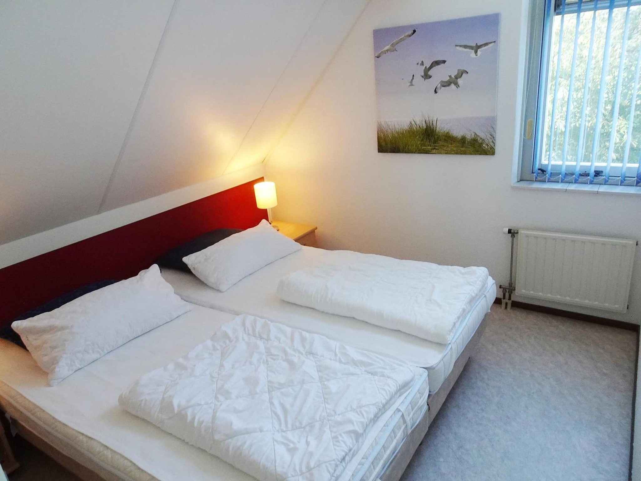Een slaapkamer van Scheldeveste 161 ZwinBreskens in Breskens