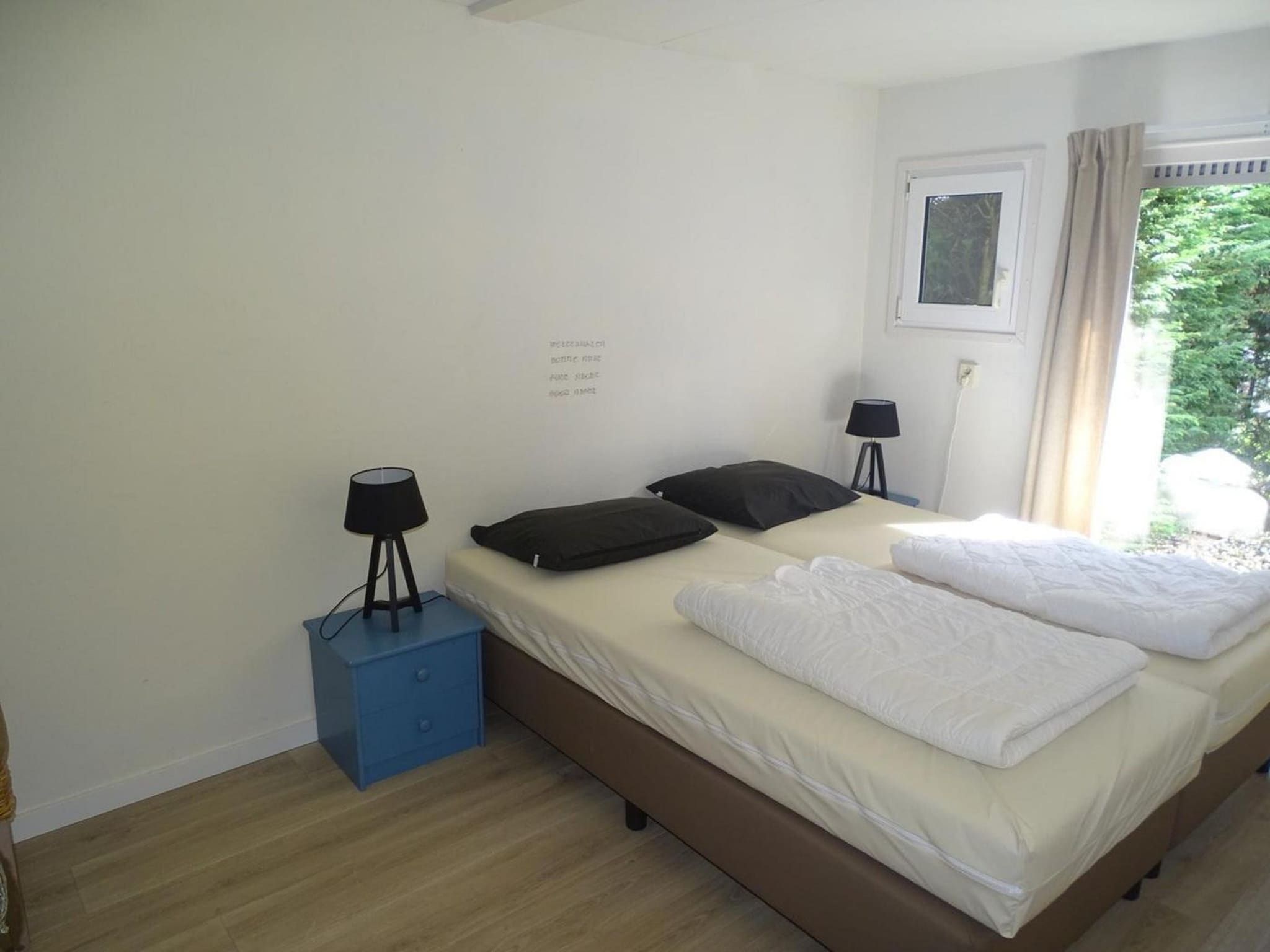 Een slaapkamer van Schoneveld 40 Zeester Breskens in Breskens