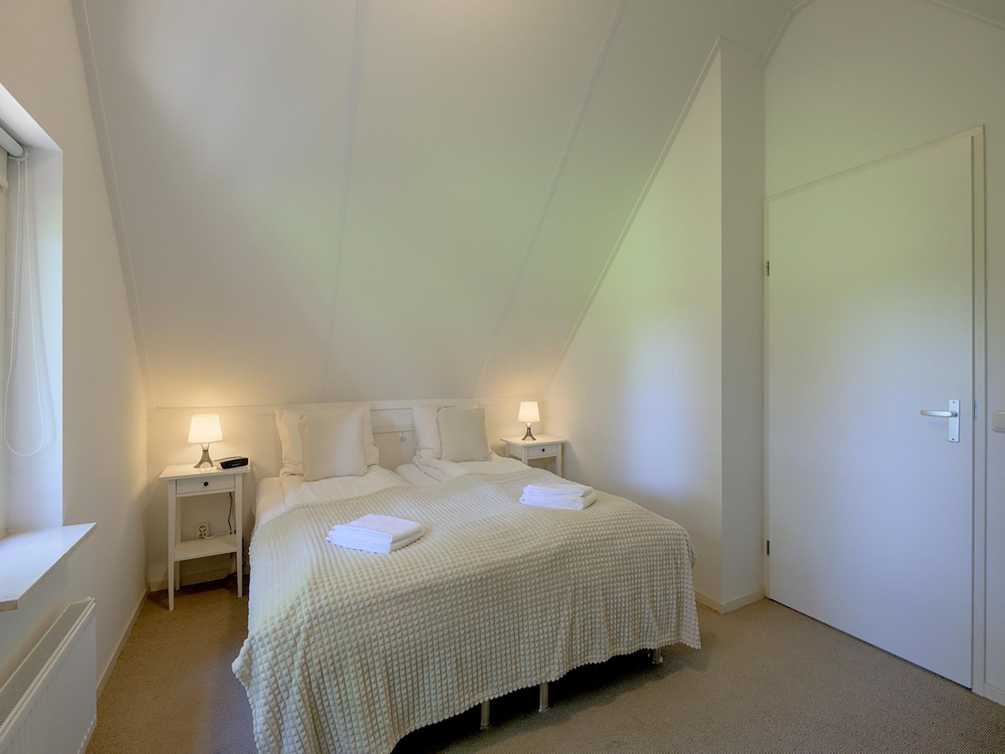 Een slaapkamer van 6-persoons bungalow 4 in Sondel