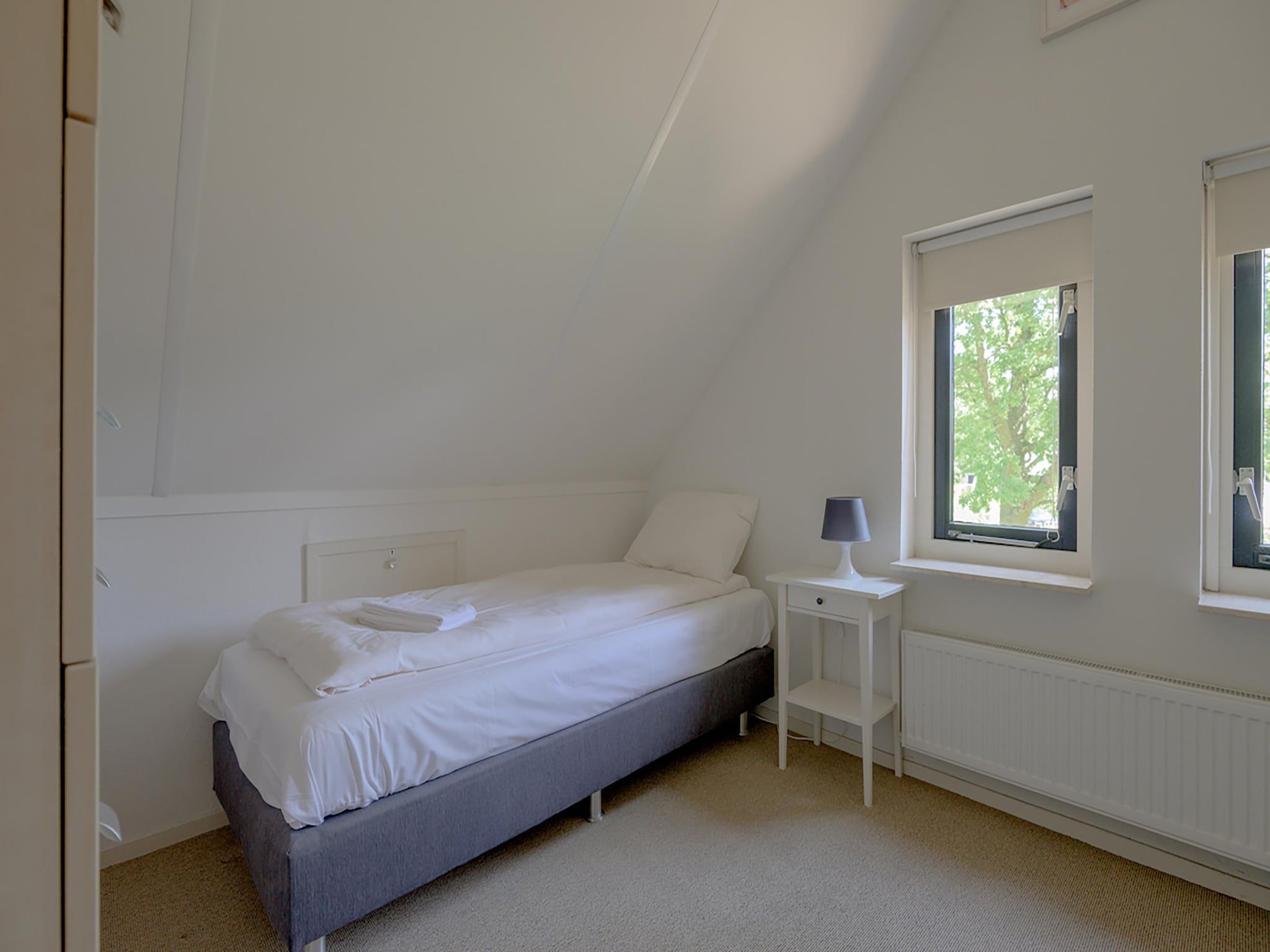 Een slaapkamer van 6-persoons bungalow 4 in Sondel