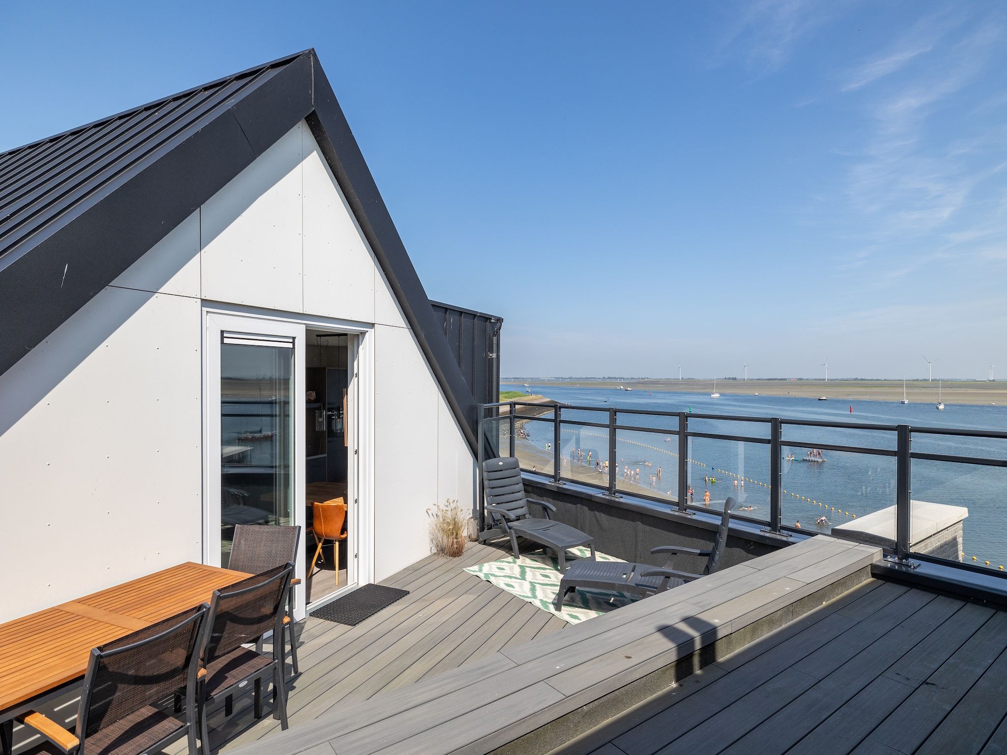 Het uitzicht vanaf Luxe appartement Vista Maris - Havenweg 8-40  Sint-Annaland Oosterschelde in Sint-Annaland