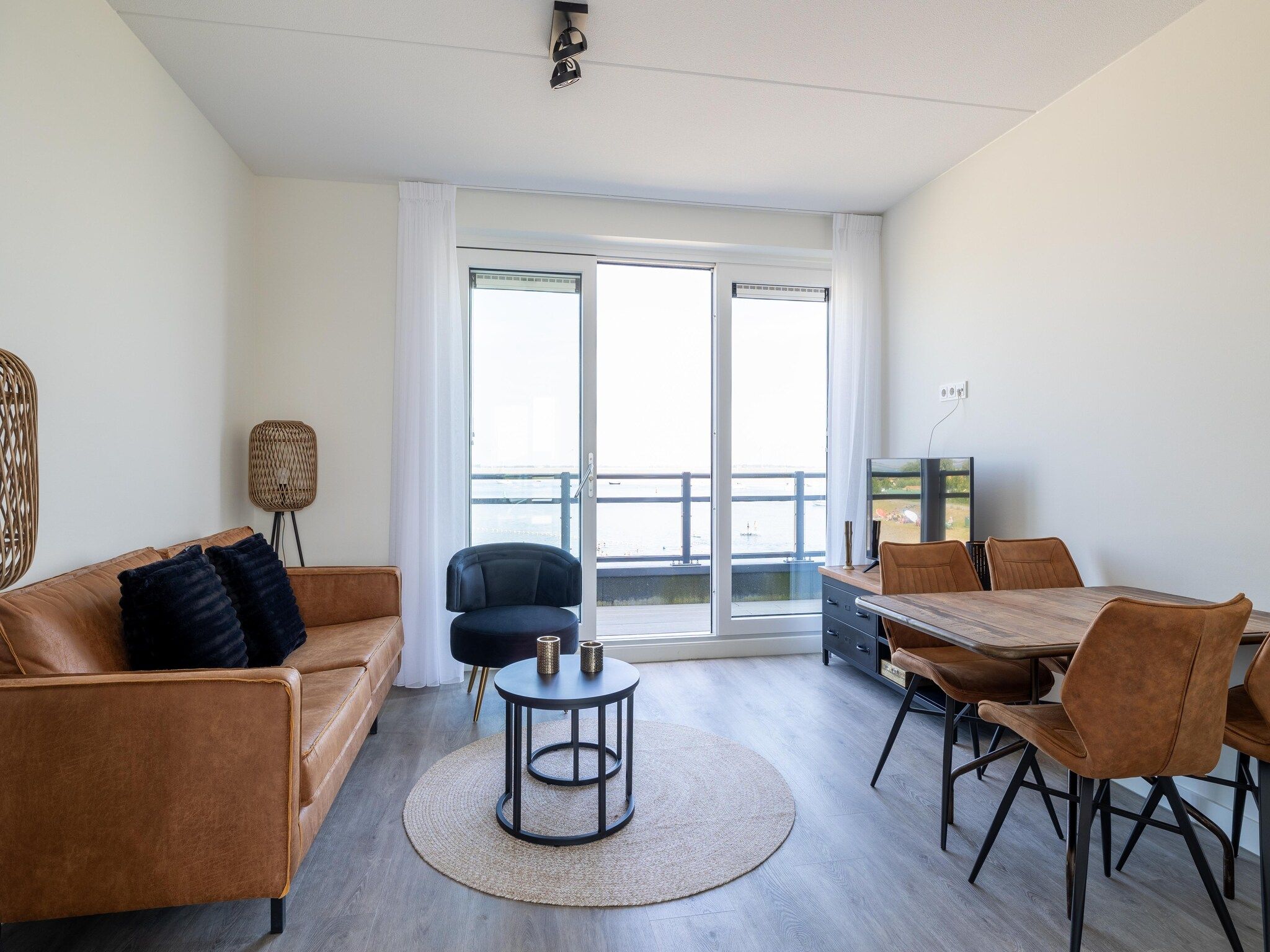 De woonkamer van Luxe appartement Vista Maris - Havenweg 8-46  Sint-Annaland Oosterschelde in Sint-Annaland