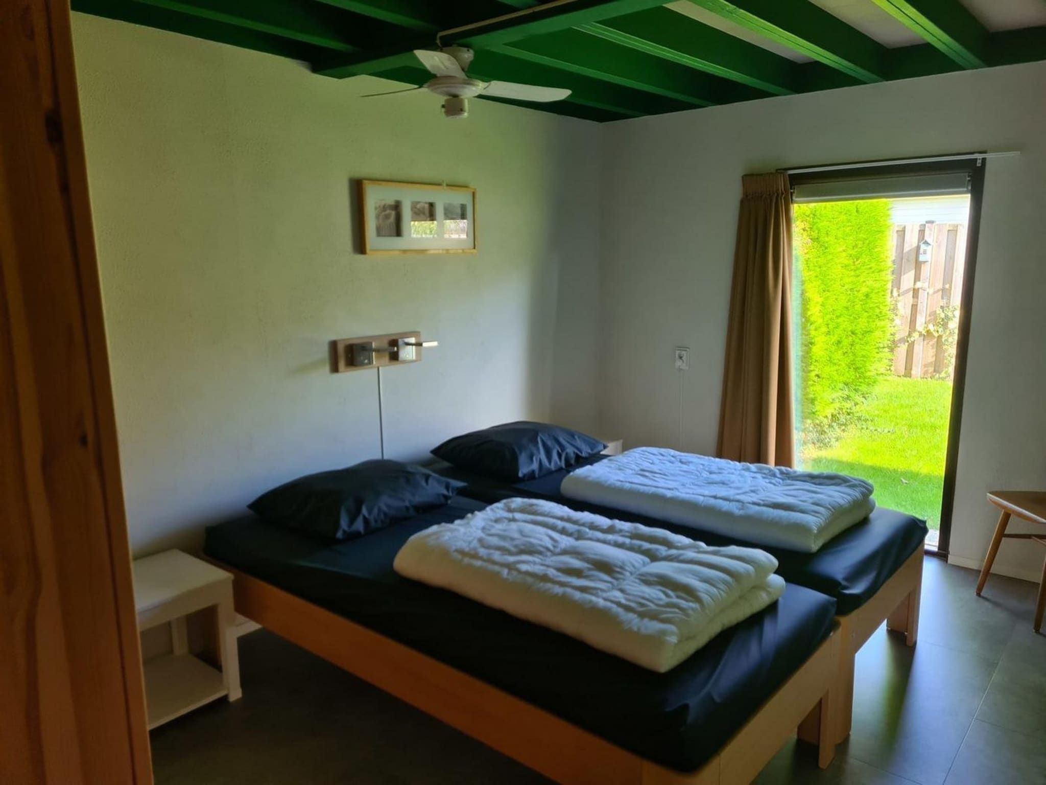 Een slaapkamer van Schoneveld 90 Zeester Breskens in Breskens