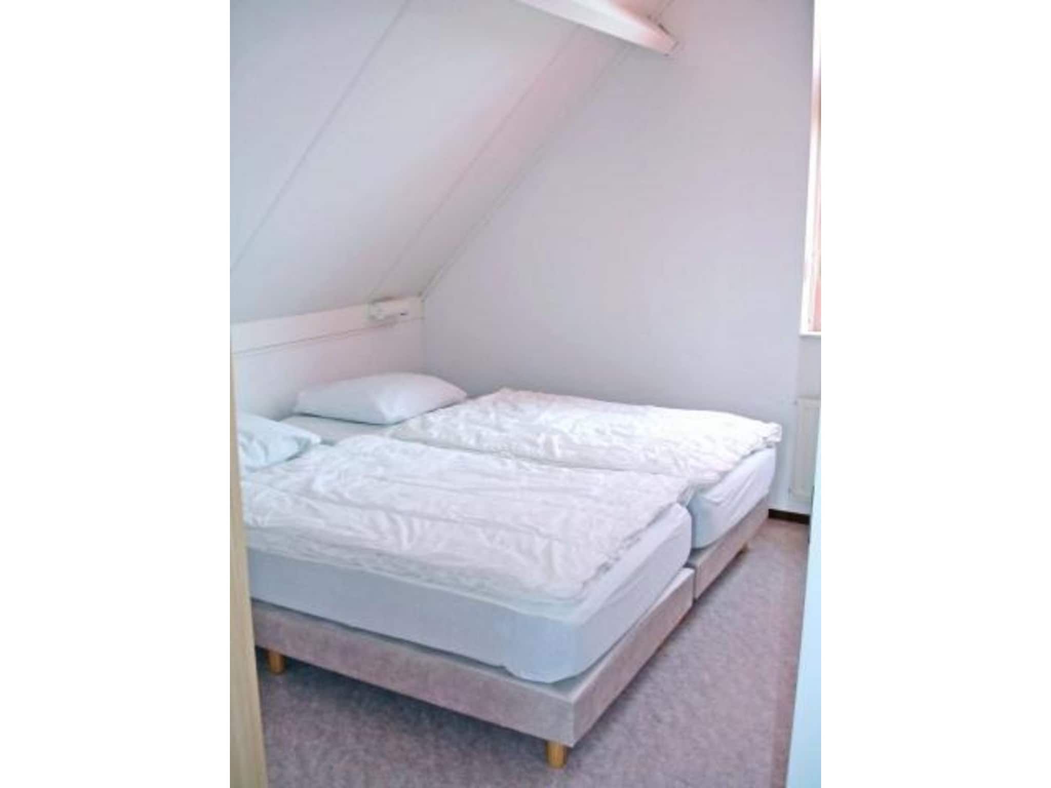 Een slaapkamer van Scheldeveste 184 Zwin Breskens in Breskens