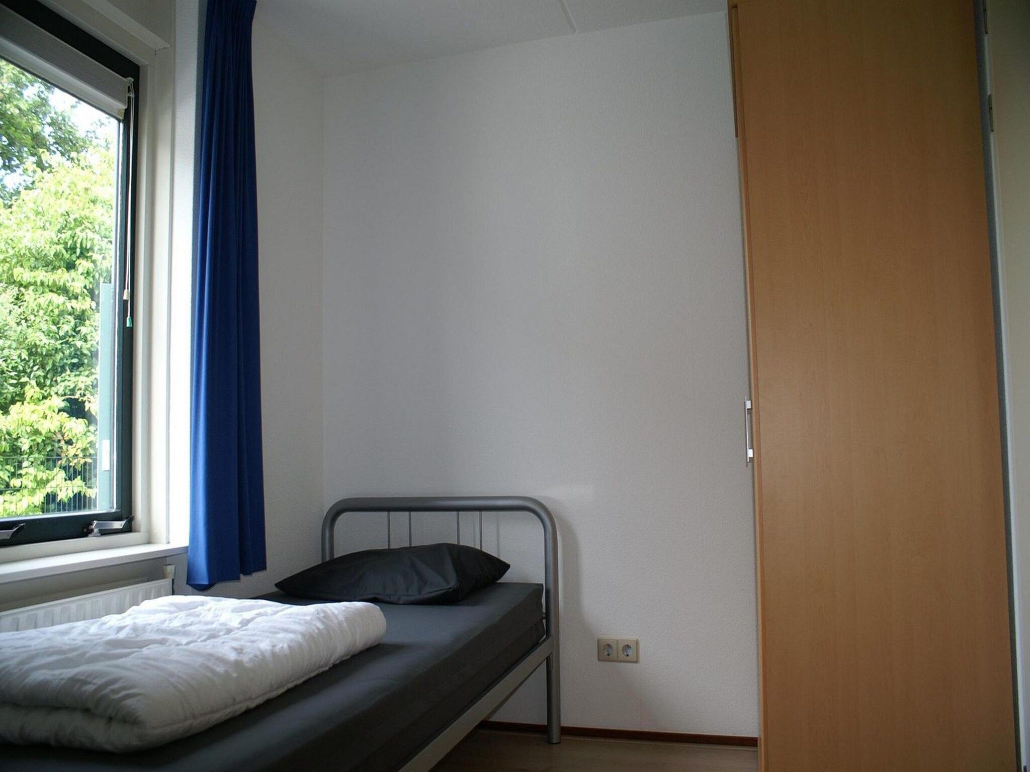 Een slaapkamer van Schoneveld 327 Stern Breskens in Breskens