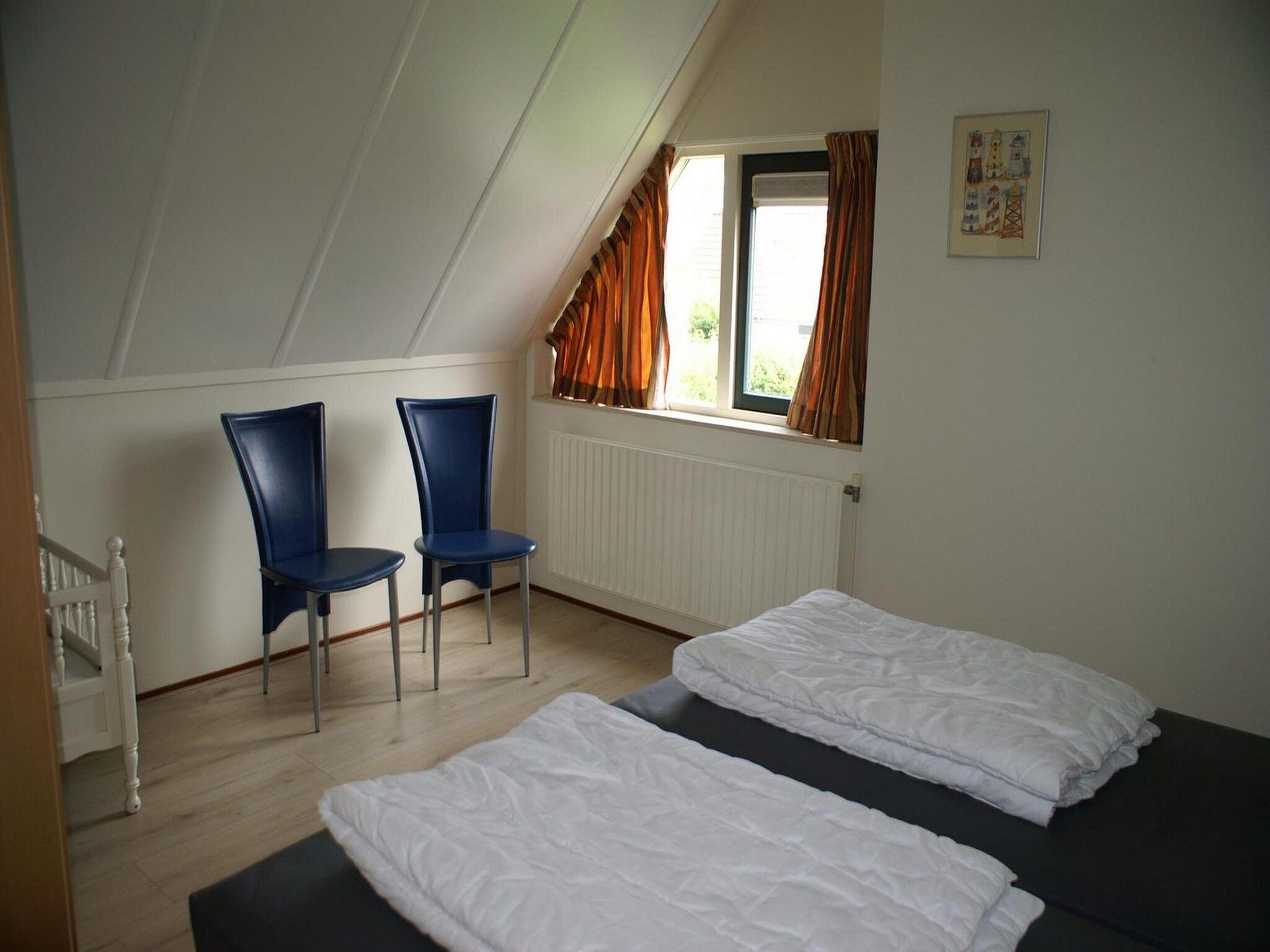 Een slaapkamer van Schoneveld 327 Stern Breskens in Breskens