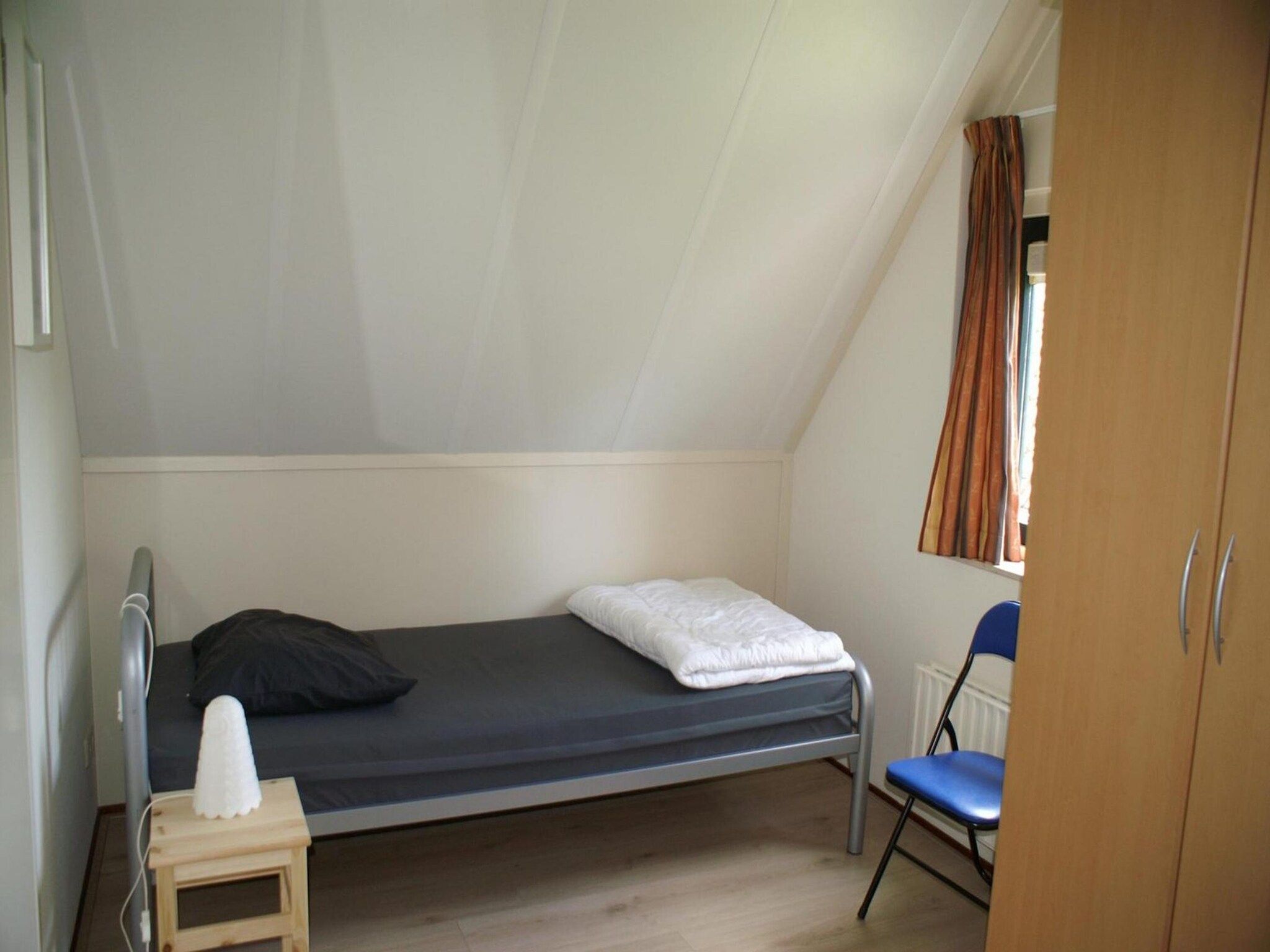 Een slaapkamer van Schoneveld 327 Stern Breskens in Breskens