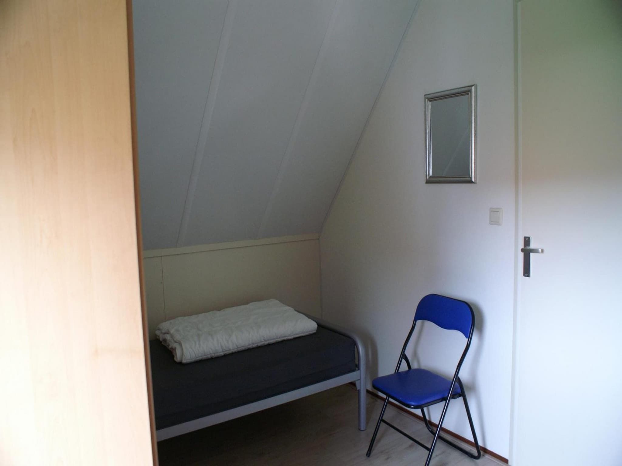 Een slaapkamer van Schoneveld 327 Stern Breskens in Breskens