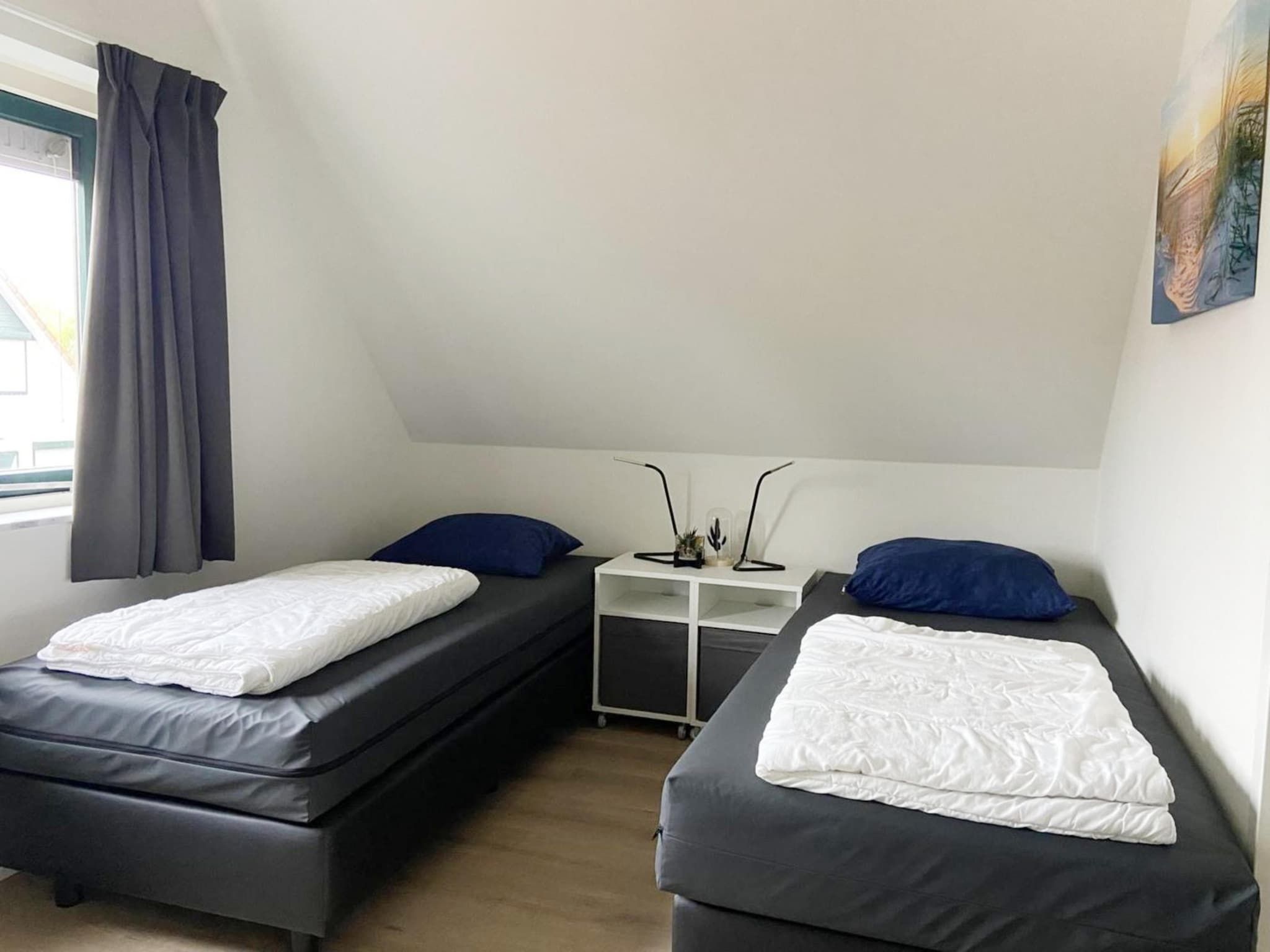 Een slaapkamer van Schoneveld 114 Zeemeeuw Breskens in Breskens