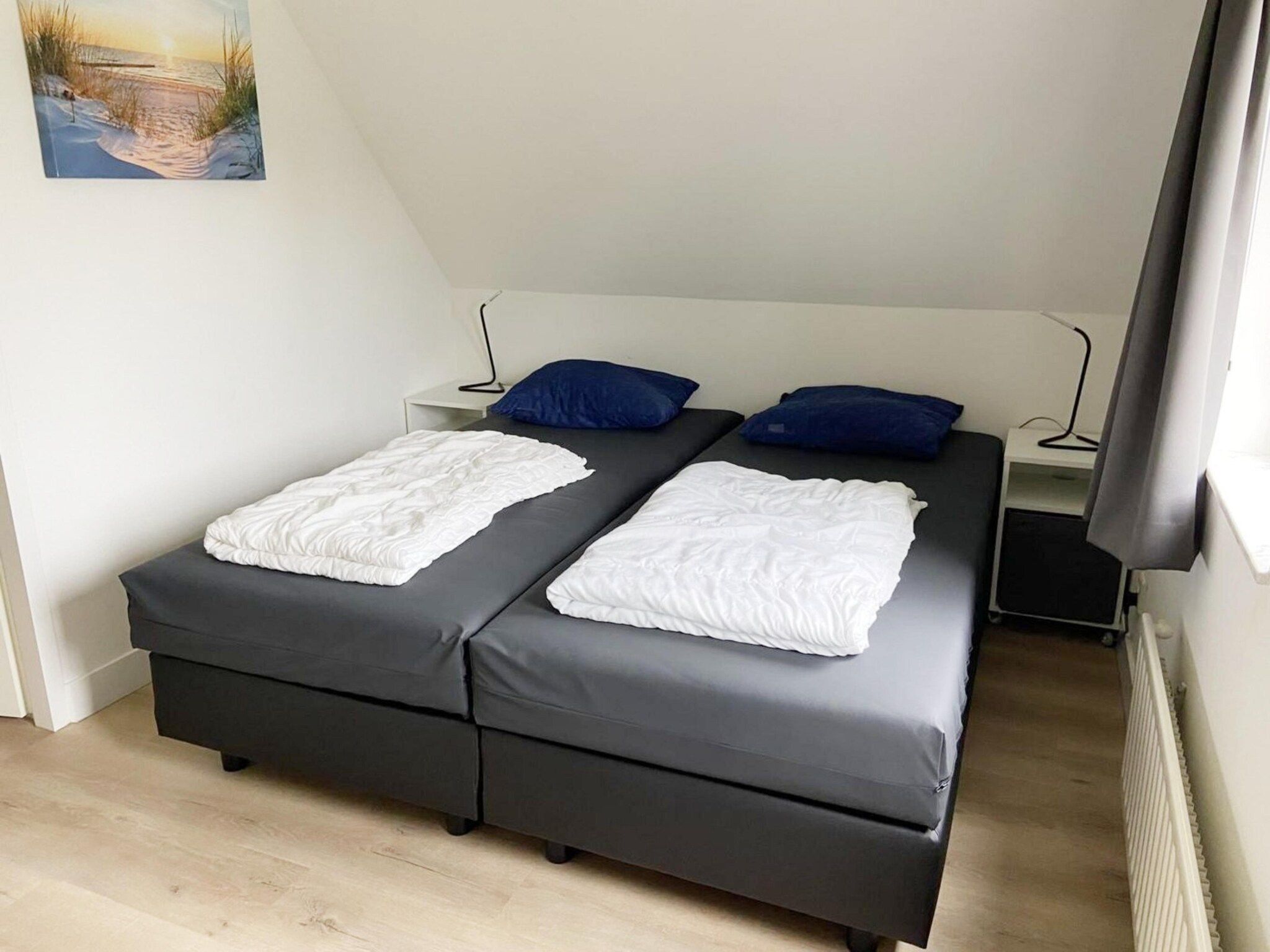 Een slaapkamer van Schoneveld 114 Zeemeeuw Breskens in Breskens