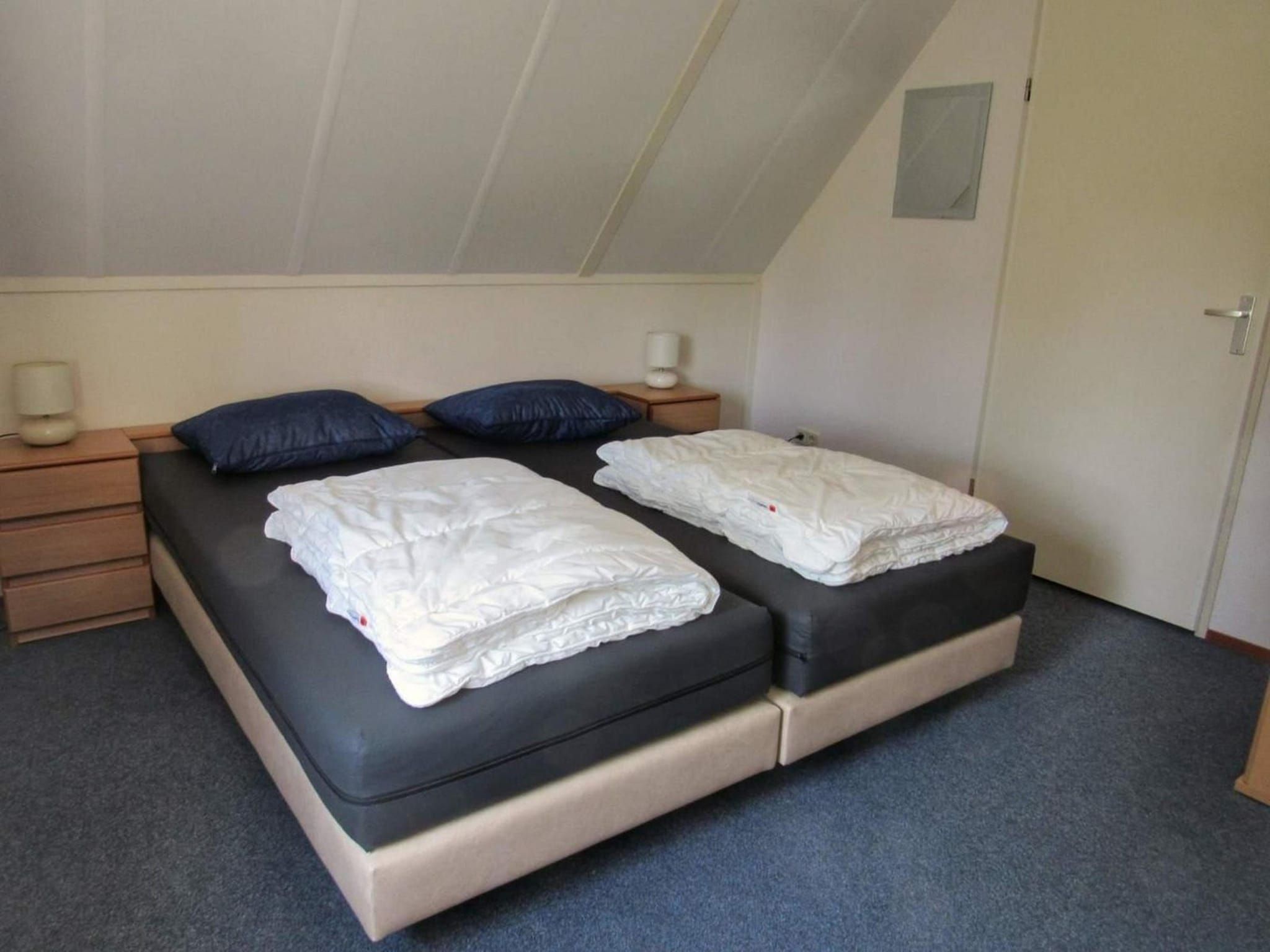 Een slaapkamer van Schoneveld 325 Stern Breskens in Breskens