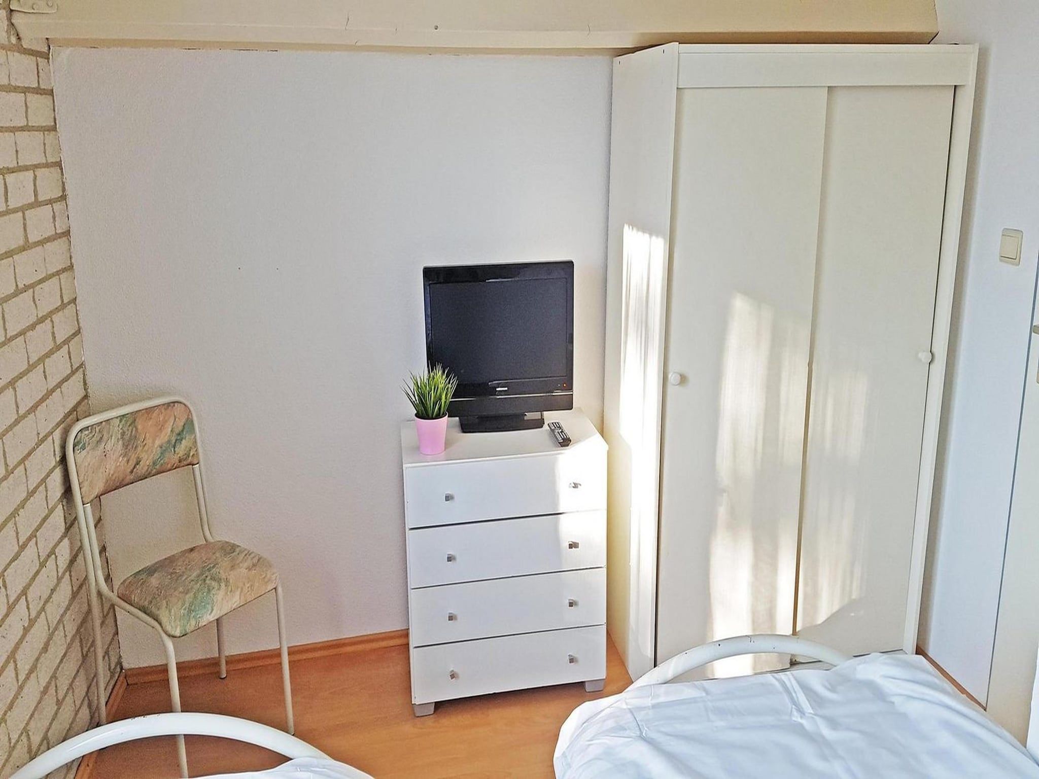 Een slaapkamer van Schoneveld 353 Strandparel Breskens in Breskens