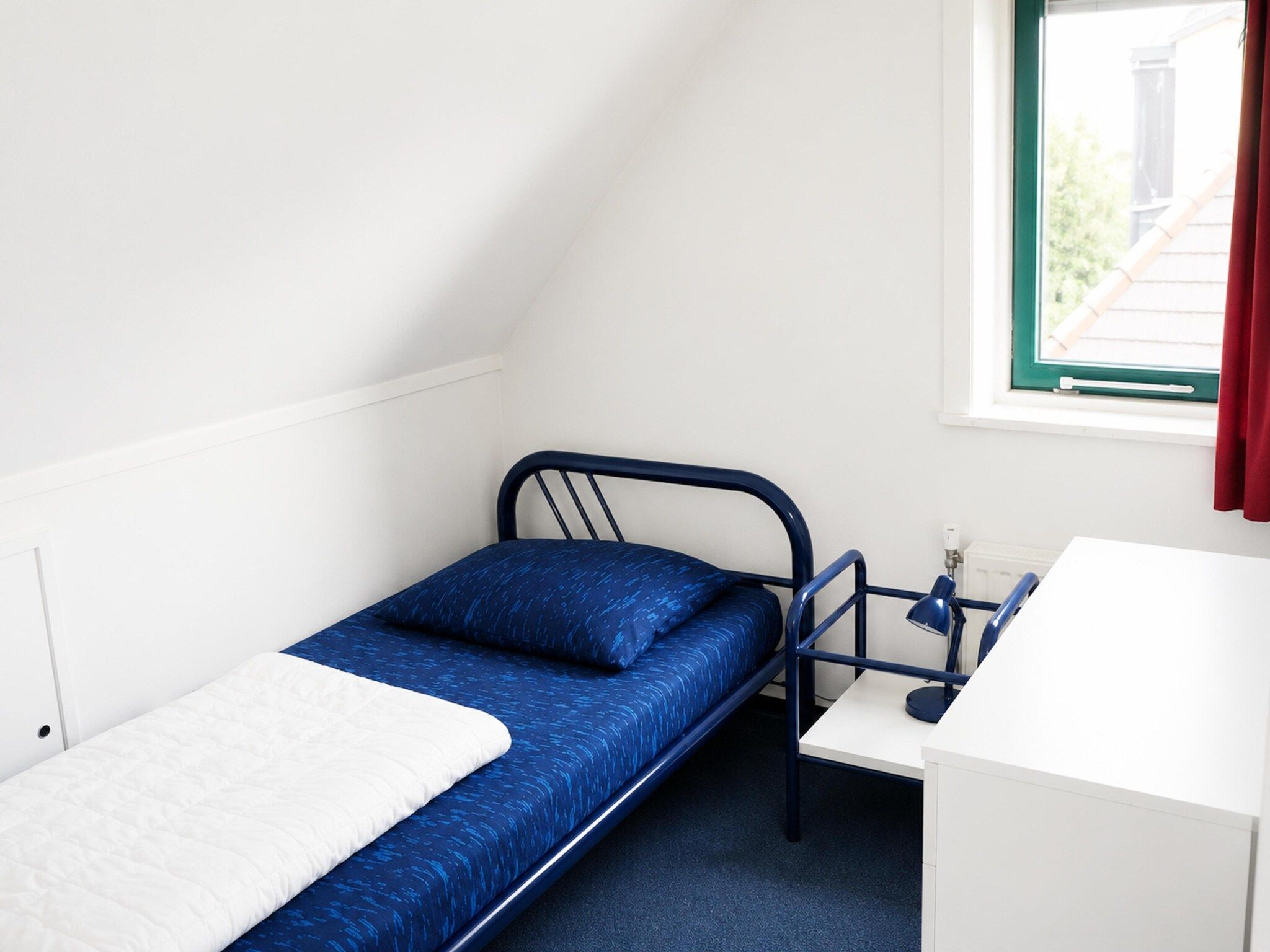 Een slaapkamer van Schoneveld 132 Zeemeeuw Breskens in Breskens