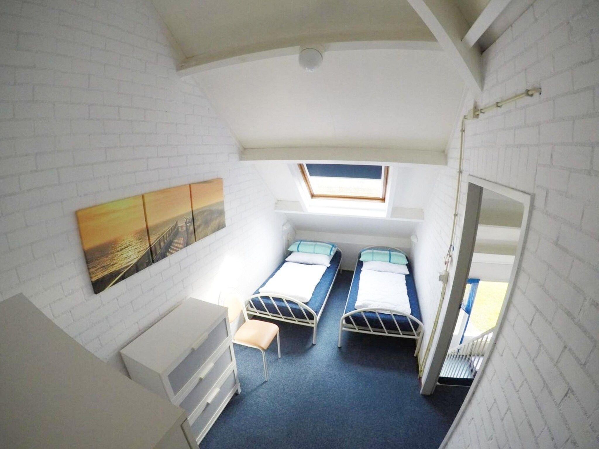 Een slaapkamer van Schoneveld 137 Duinroos Breskens in Breskens