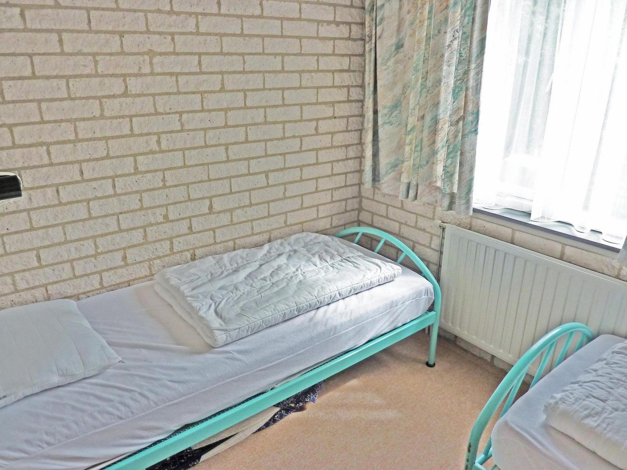 Een slaapkamer van Schoneveld 371 Strandparel Breskens in Breskens