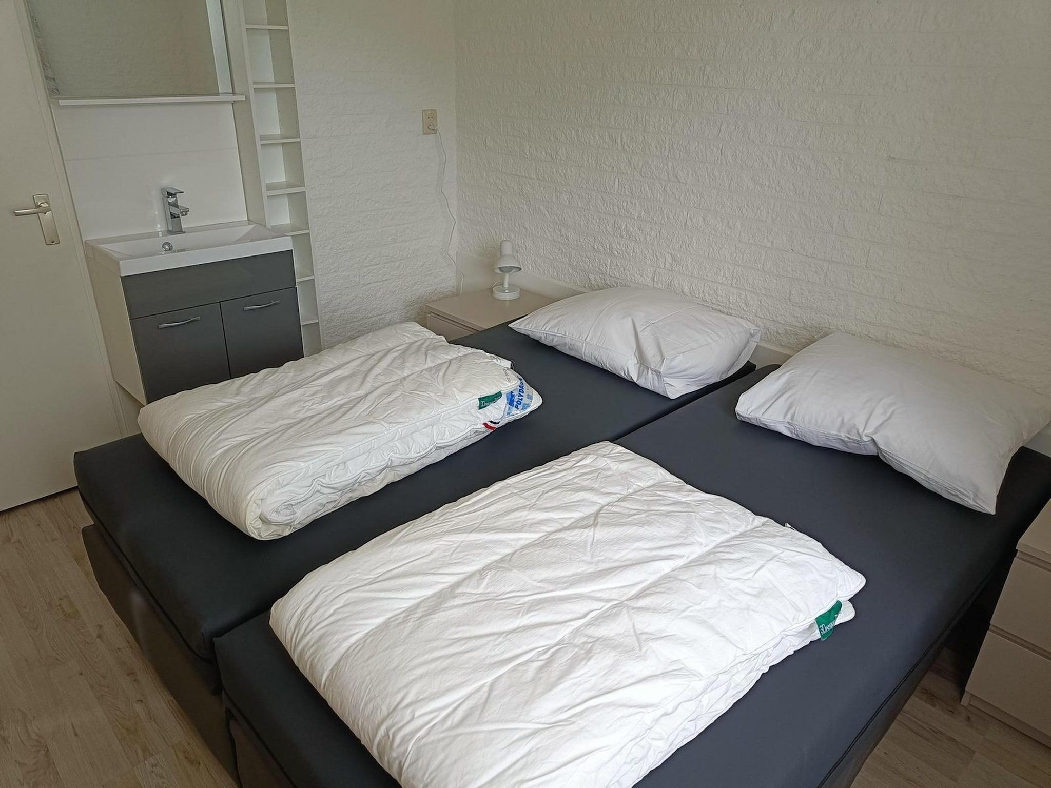 Een slaapkamer van Schoneveld 373 Strandparel Breskens in Breskens