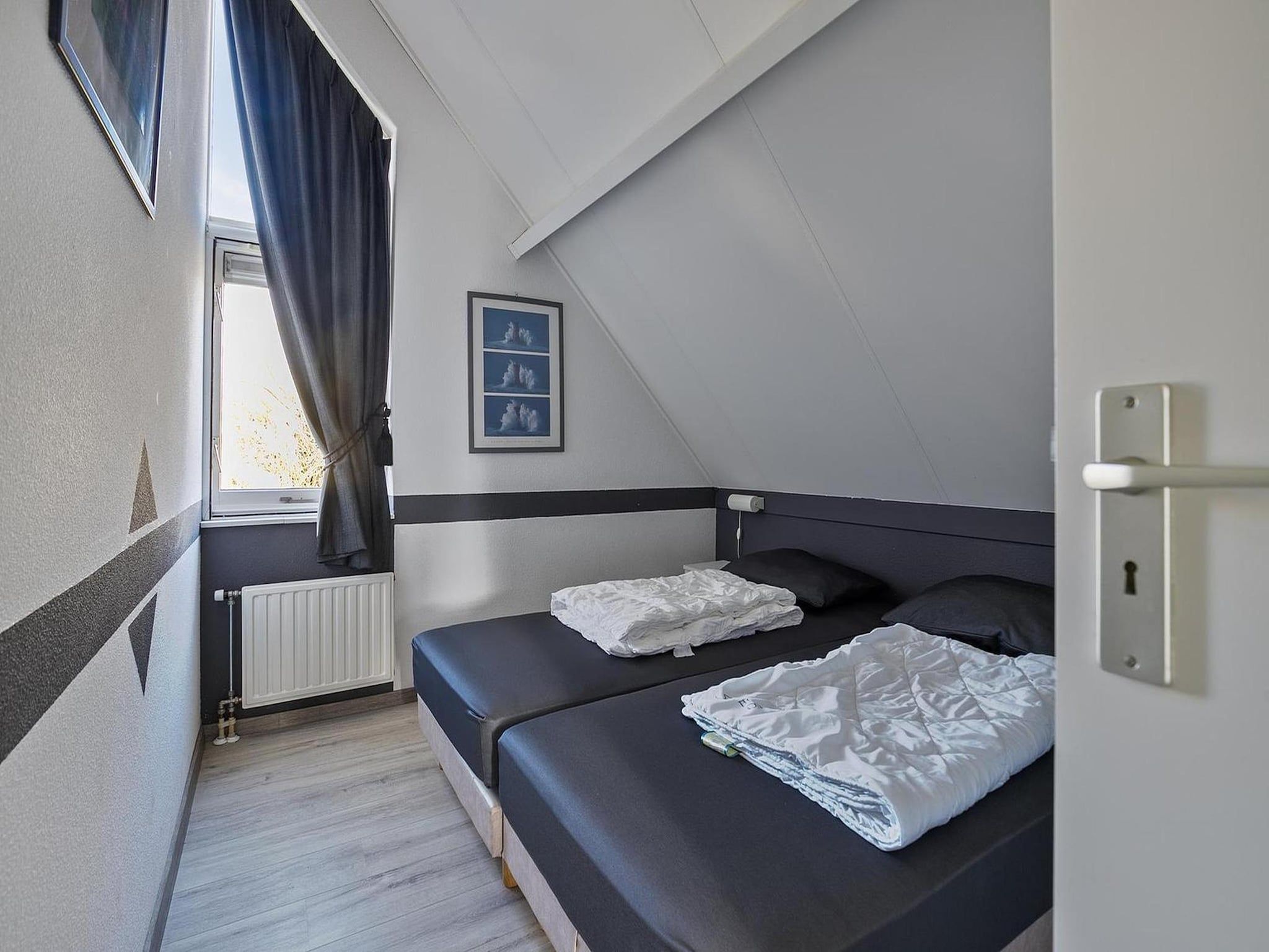 Een slaapkamer van Scheldeveste 8 Zwin Breskens in Breskens
