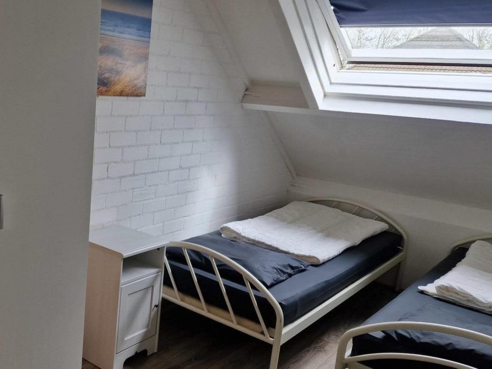 Een slaapkamer van Schoneveld 157 Duinroos Breskens in Breskens