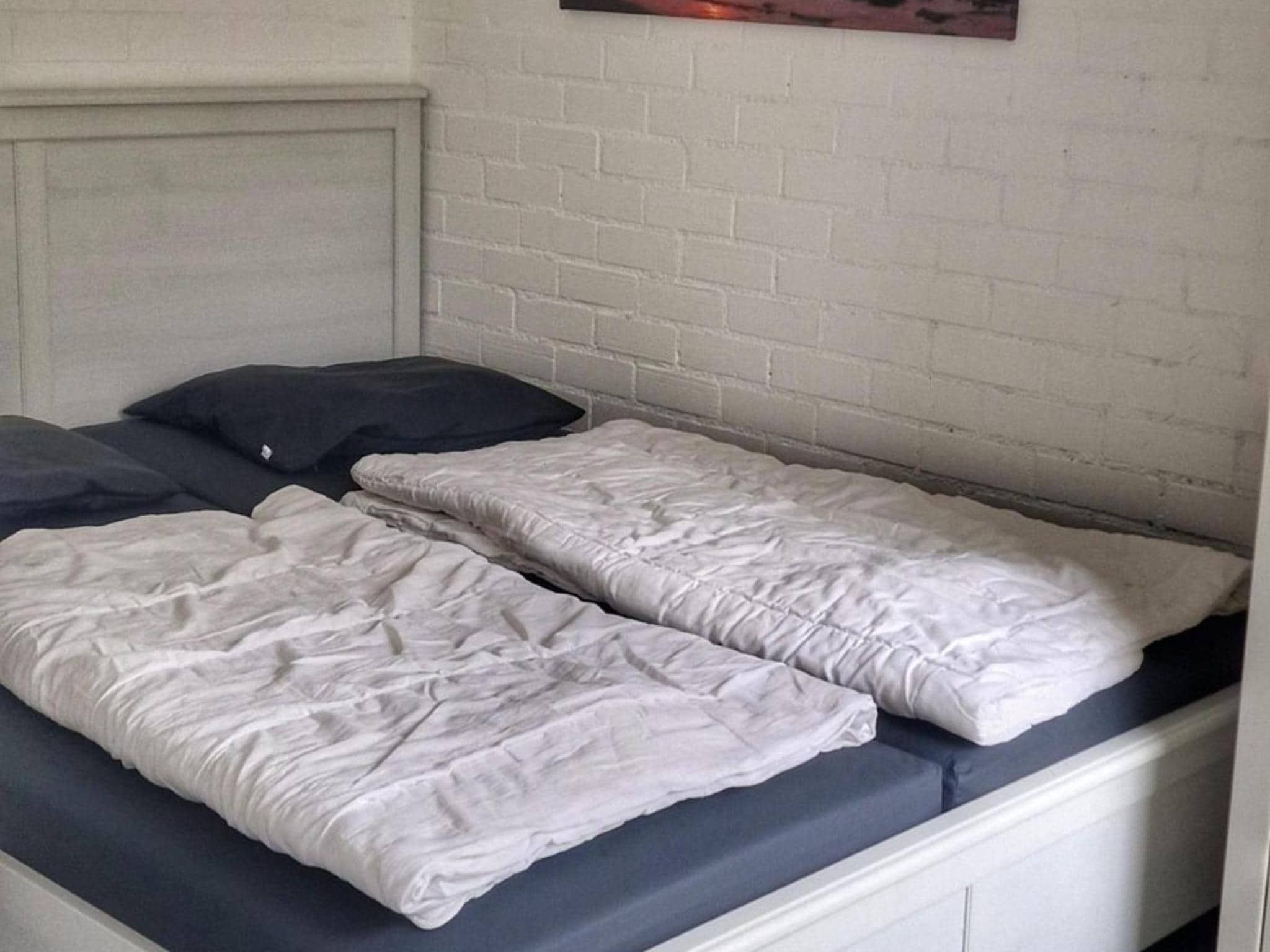 Een slaapkamer van Schoneveld 157 Duinroos Breskens in Breskens