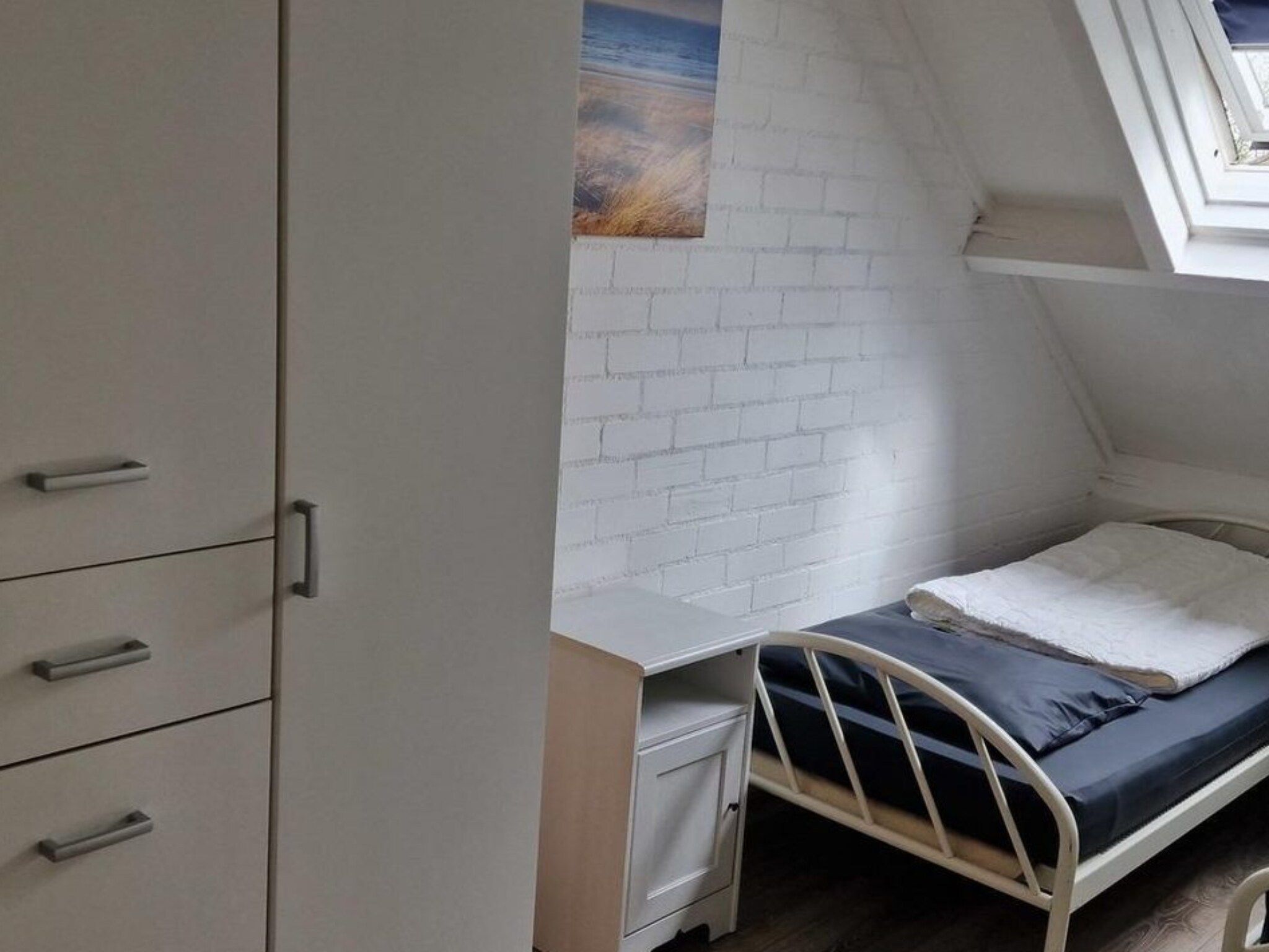 Een slaapkamer van Schoneveld 157 Duinroos Breskens in Breskens