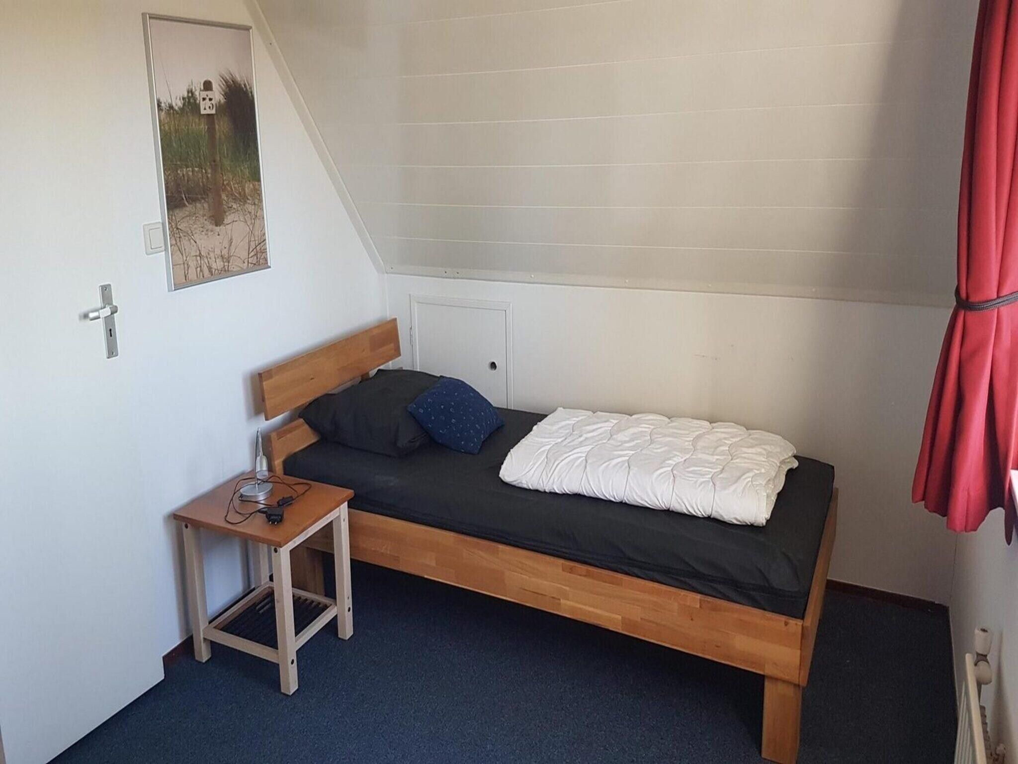Een slaapkamer van Schoneveld 170 Zeemeeuw Breskens in Breskens