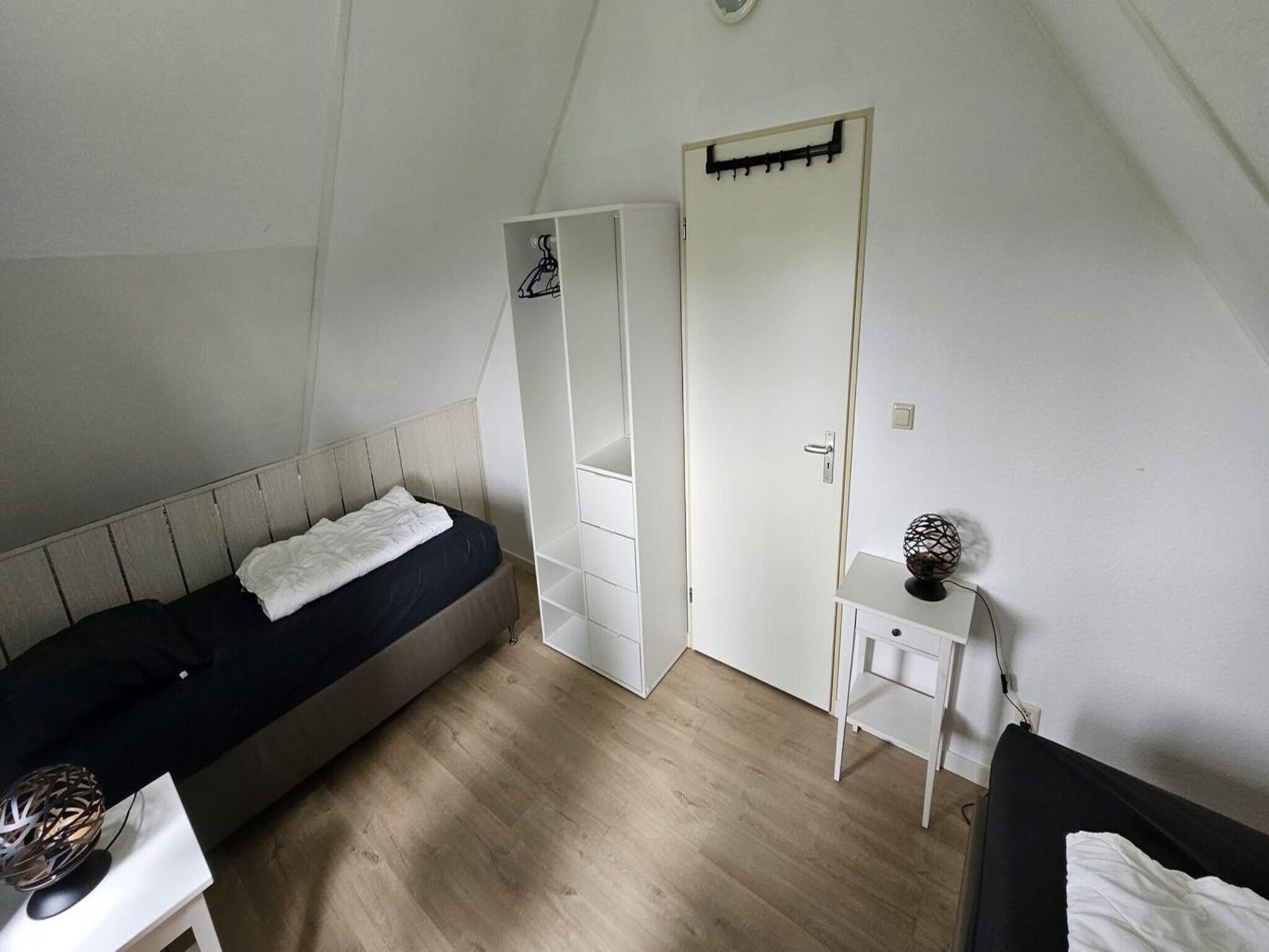 Een slaapkamer van Schoneveld 176 Zeemeeuw Breskens in Breskens