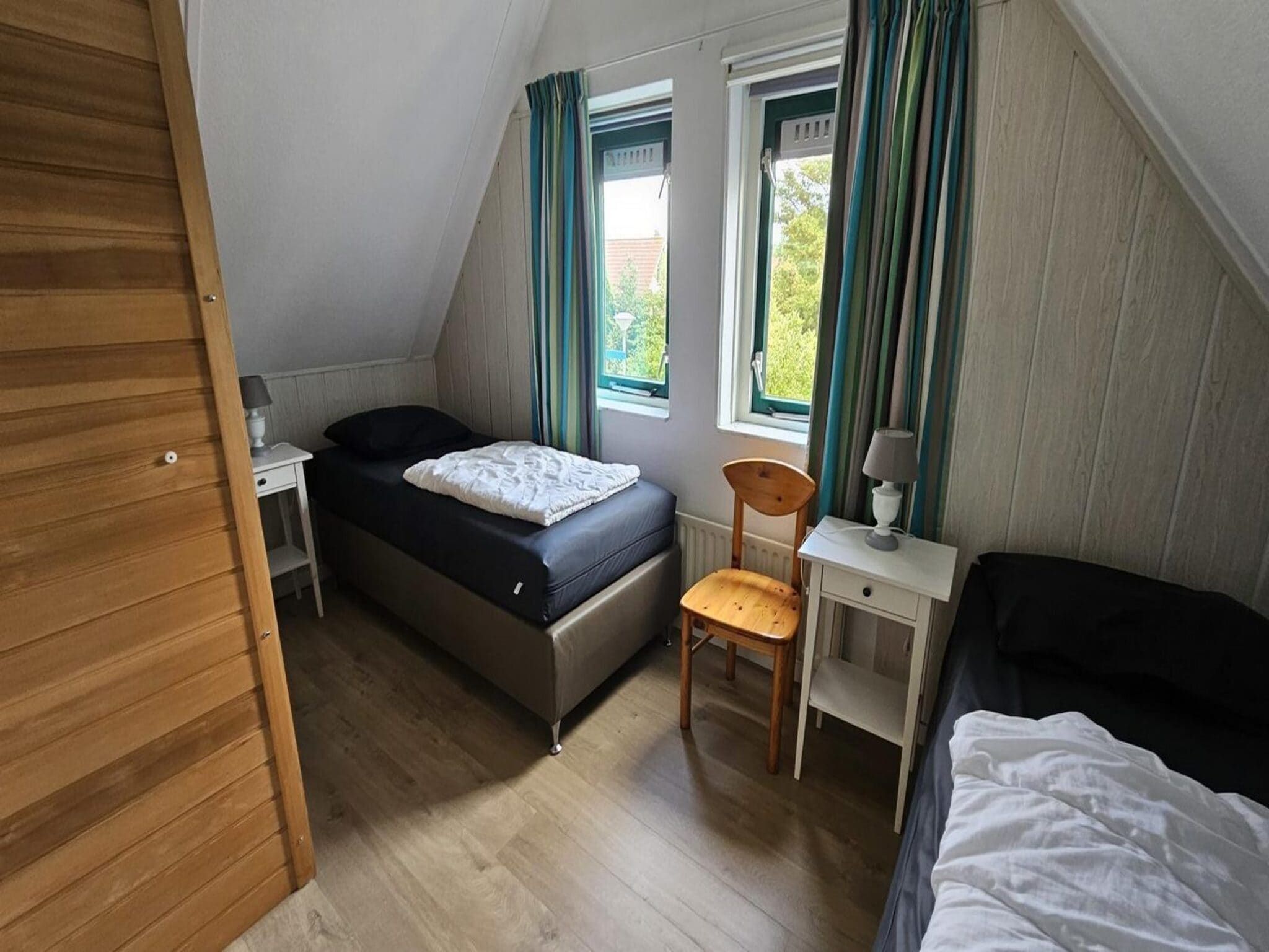 Een slaapkamer van Schoneveld 176 Zeemeeuw Breskens in Breskens