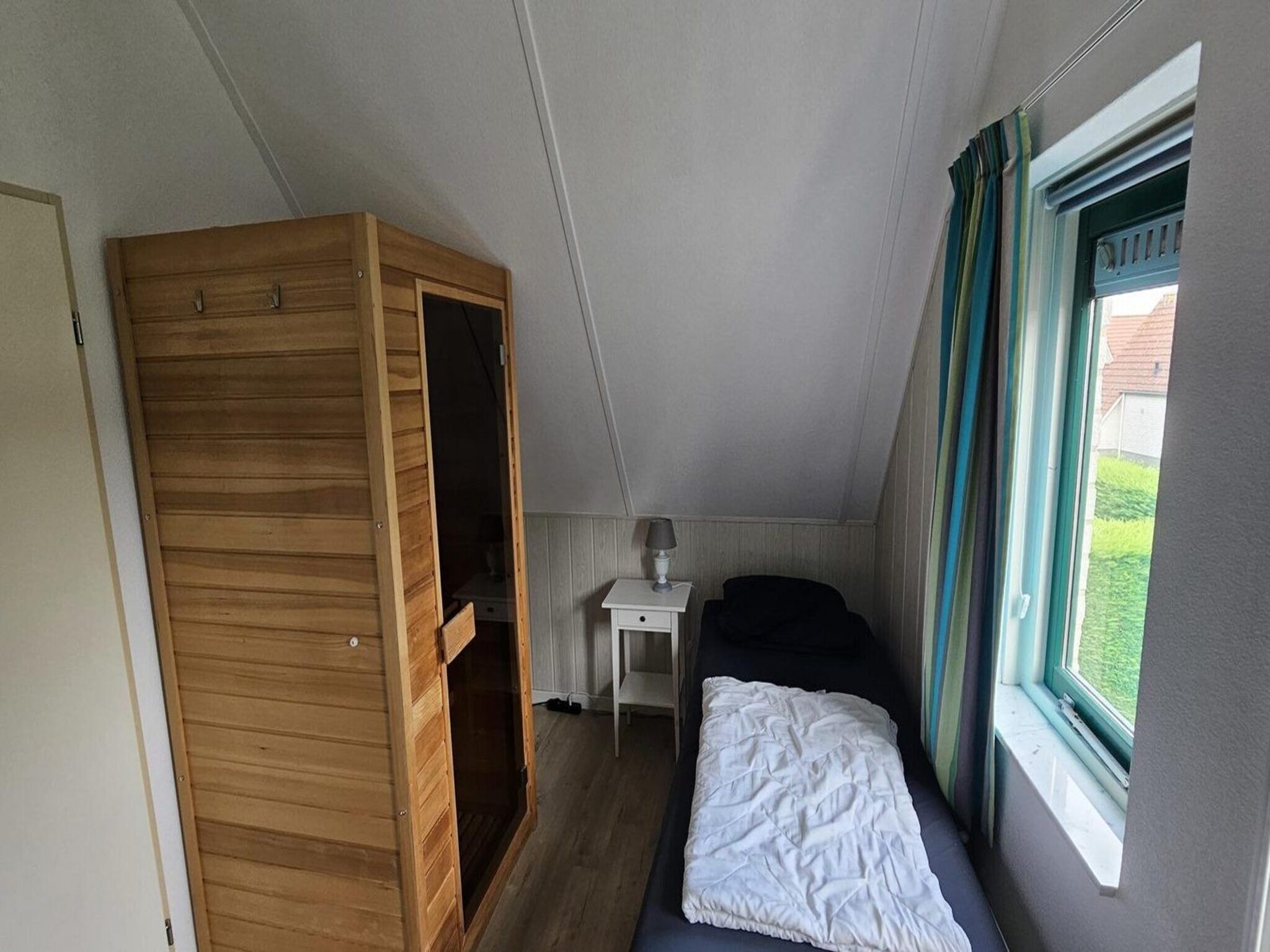 Een slaapkamer van Schoneveld 176 Zeemeeuw Breskens in Breskens
