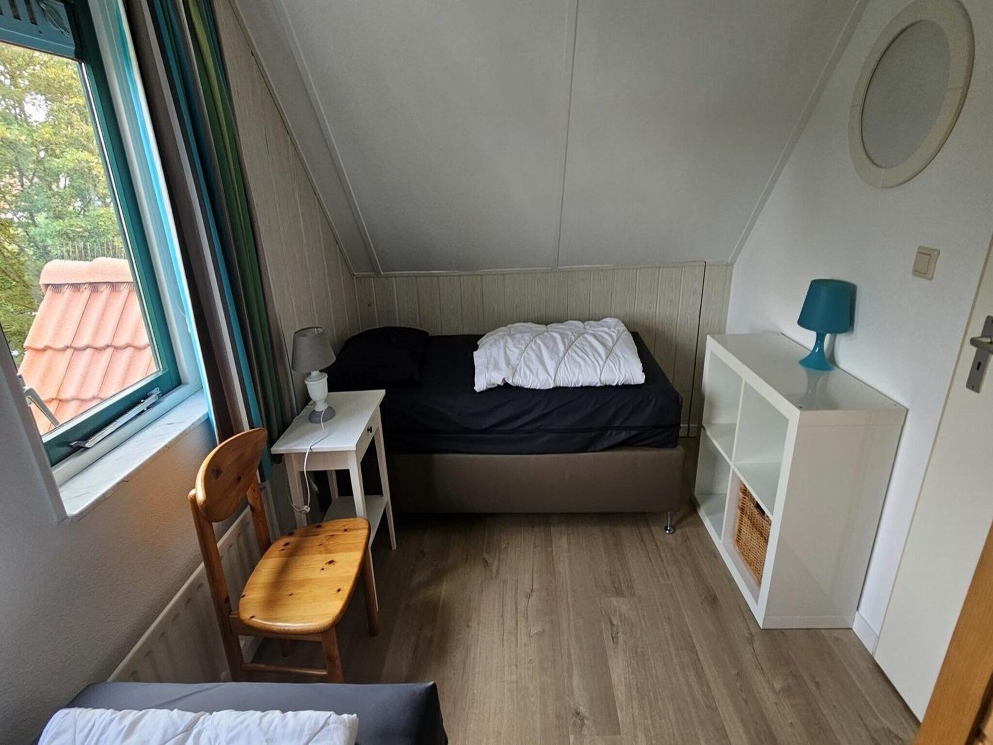 Een slaapkamer van Schoneveld 176 Zeemeeuw Breskens in Breskens