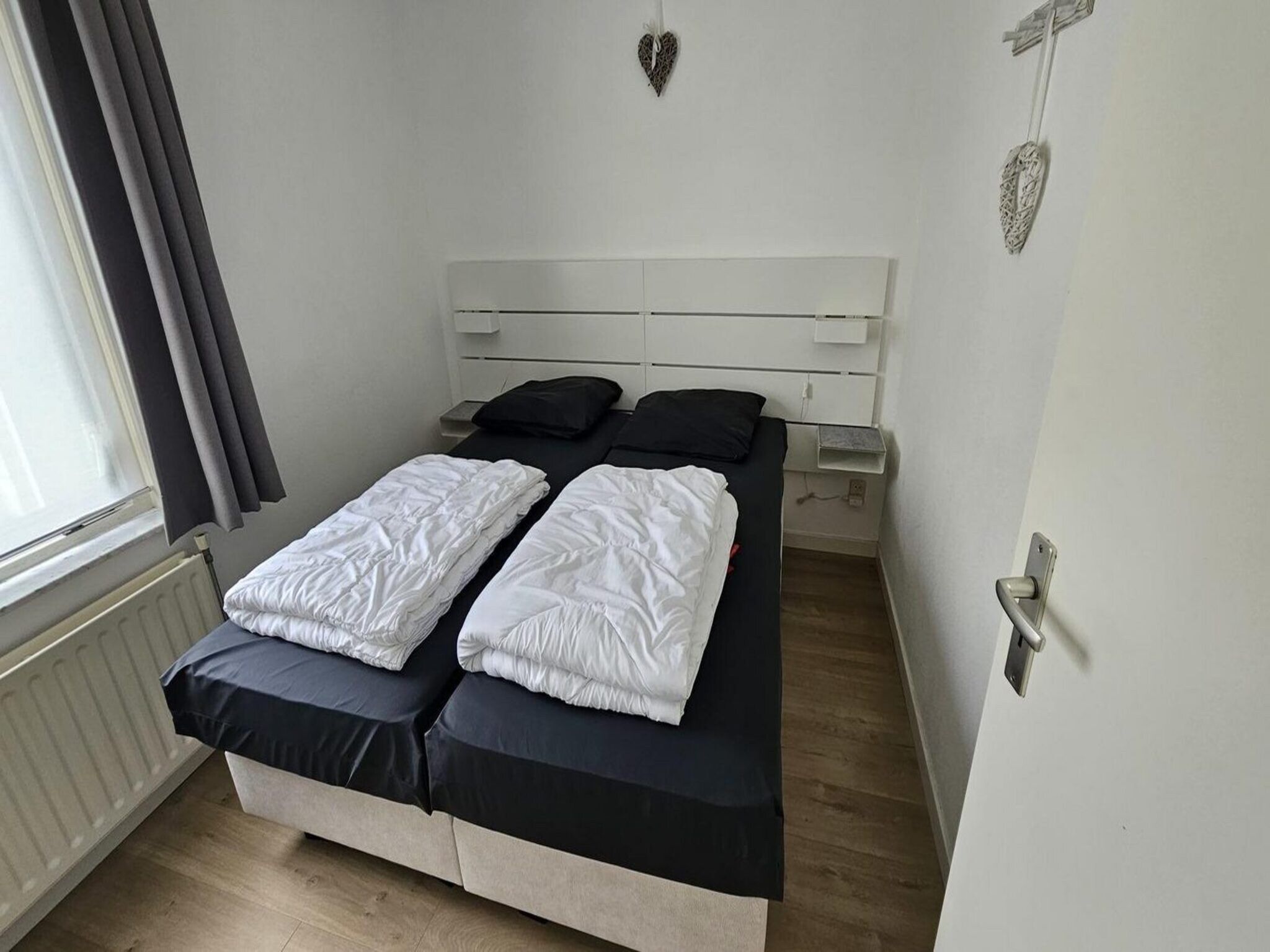 Een slaapkamer van Schoneveld 176 Zeemeeuw Breskens in Breskens