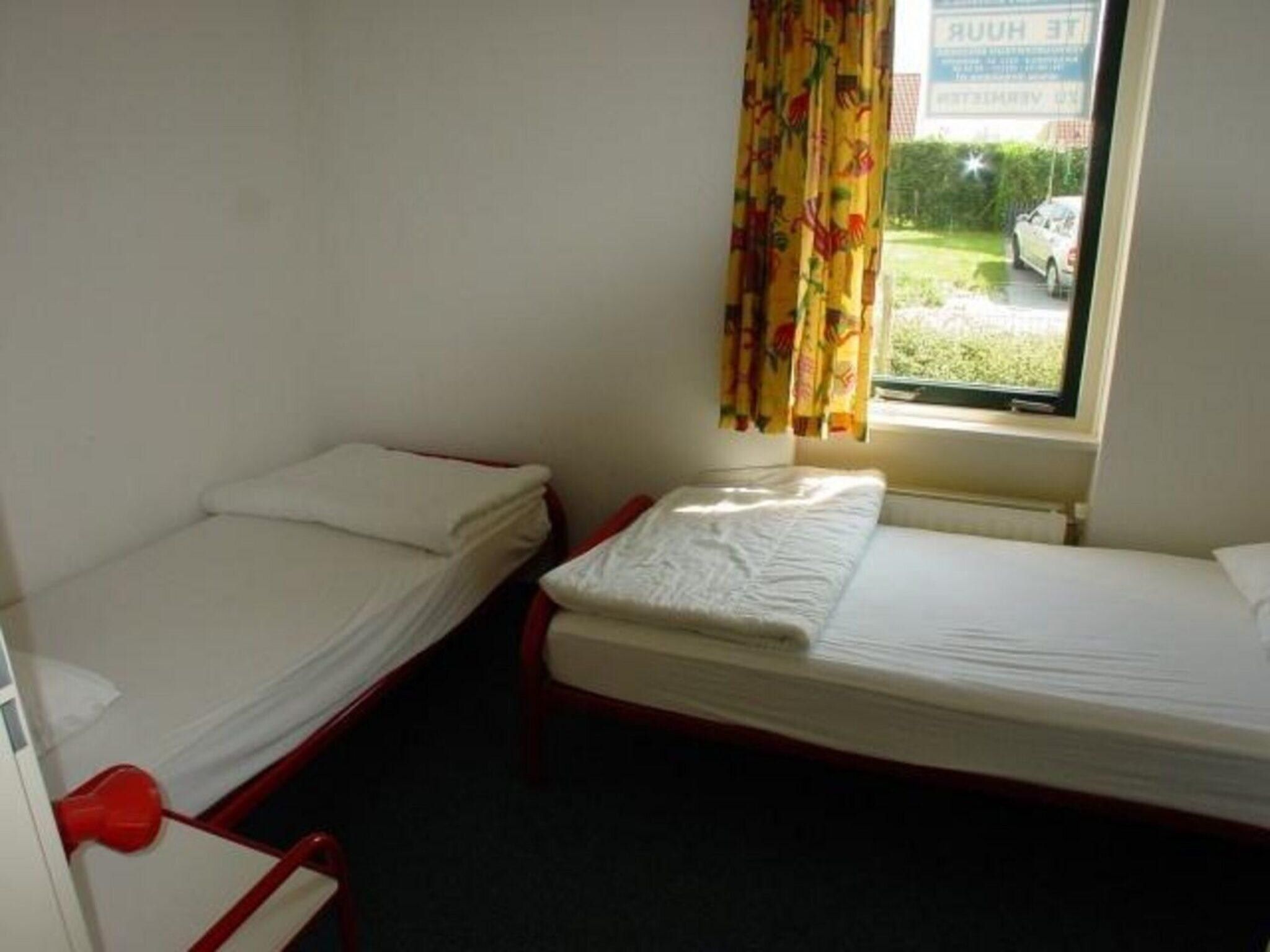 Een slaapkamer van Schoneveld 182 Stern Breskens in Breskens