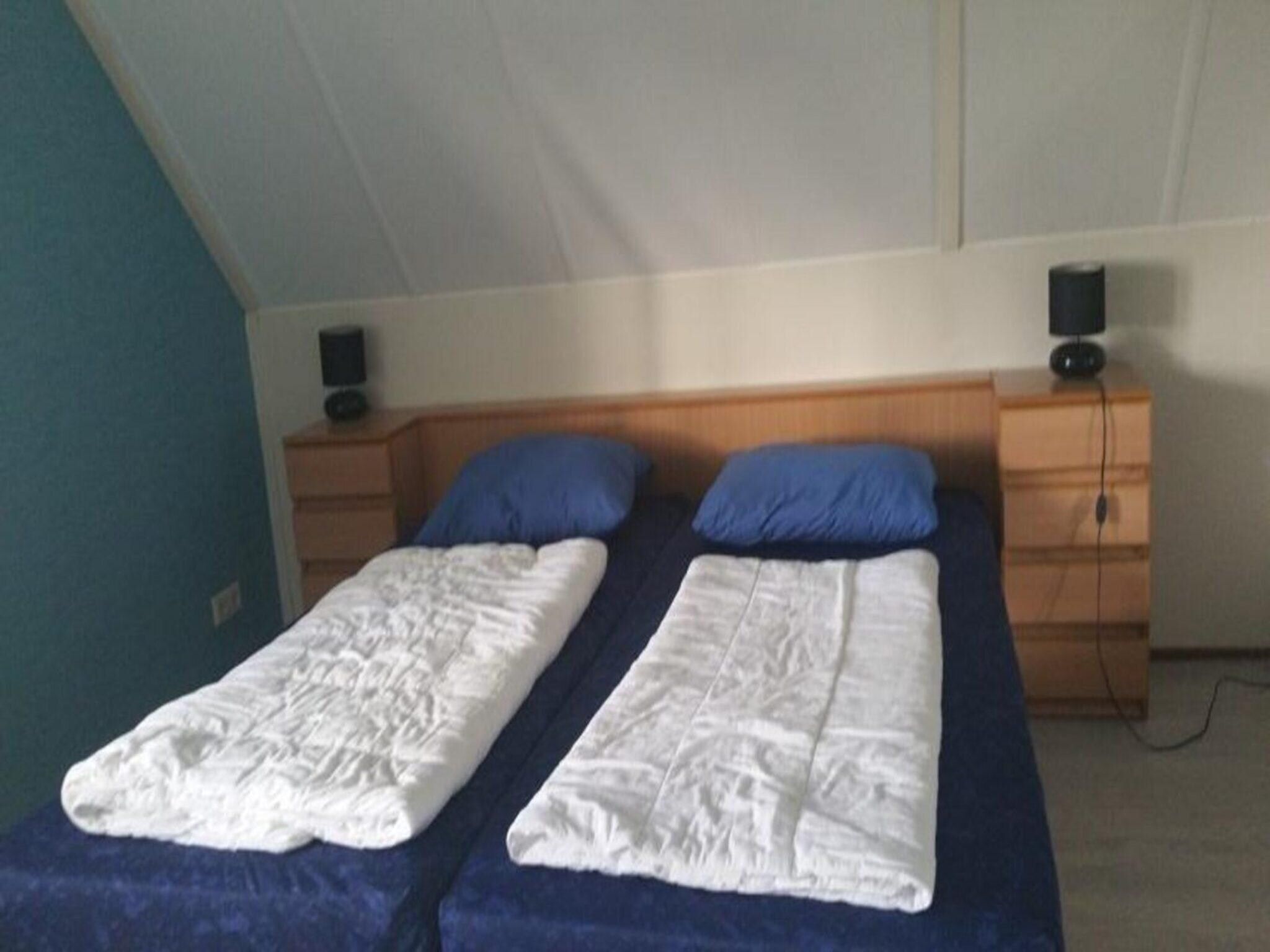 Een slaapkamer van Schoneveld 182 Stern Breskens in Breskens