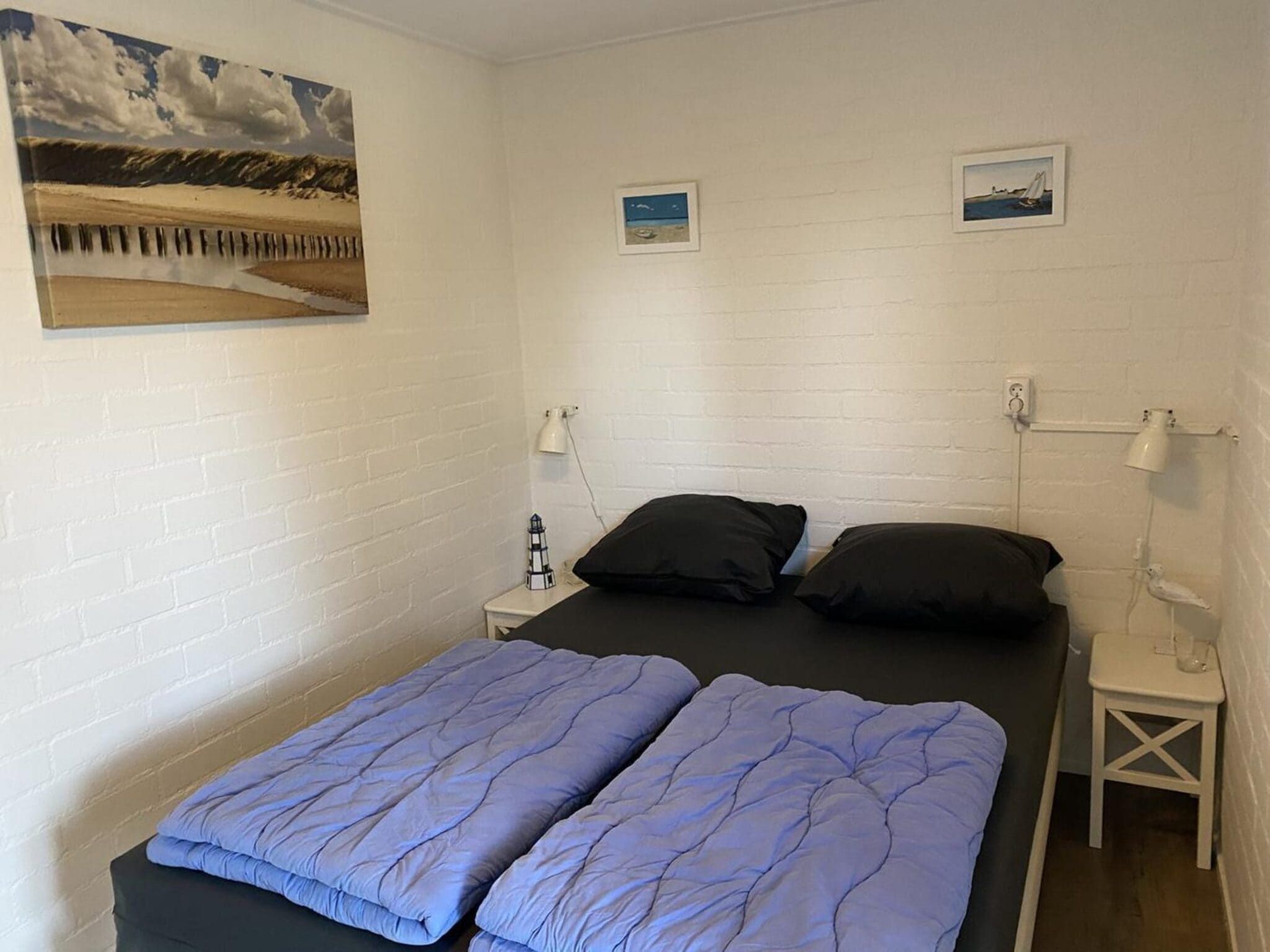 Een slaapkamer van Schoneveld 183 Duinroos Breskens in Breskens