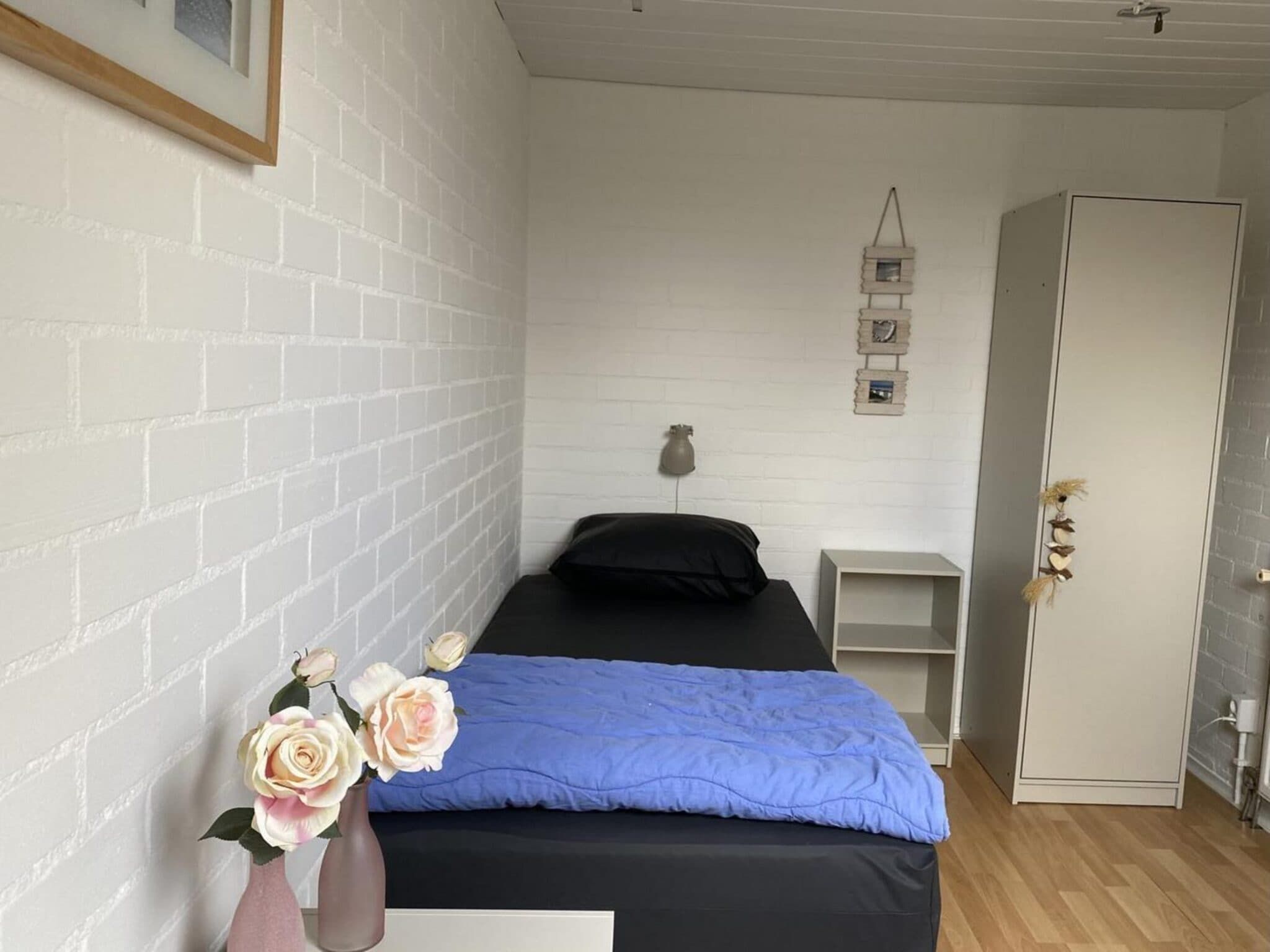 Een slaapkamer van Schoneveld 183 Duinroos Breskens in Breskens