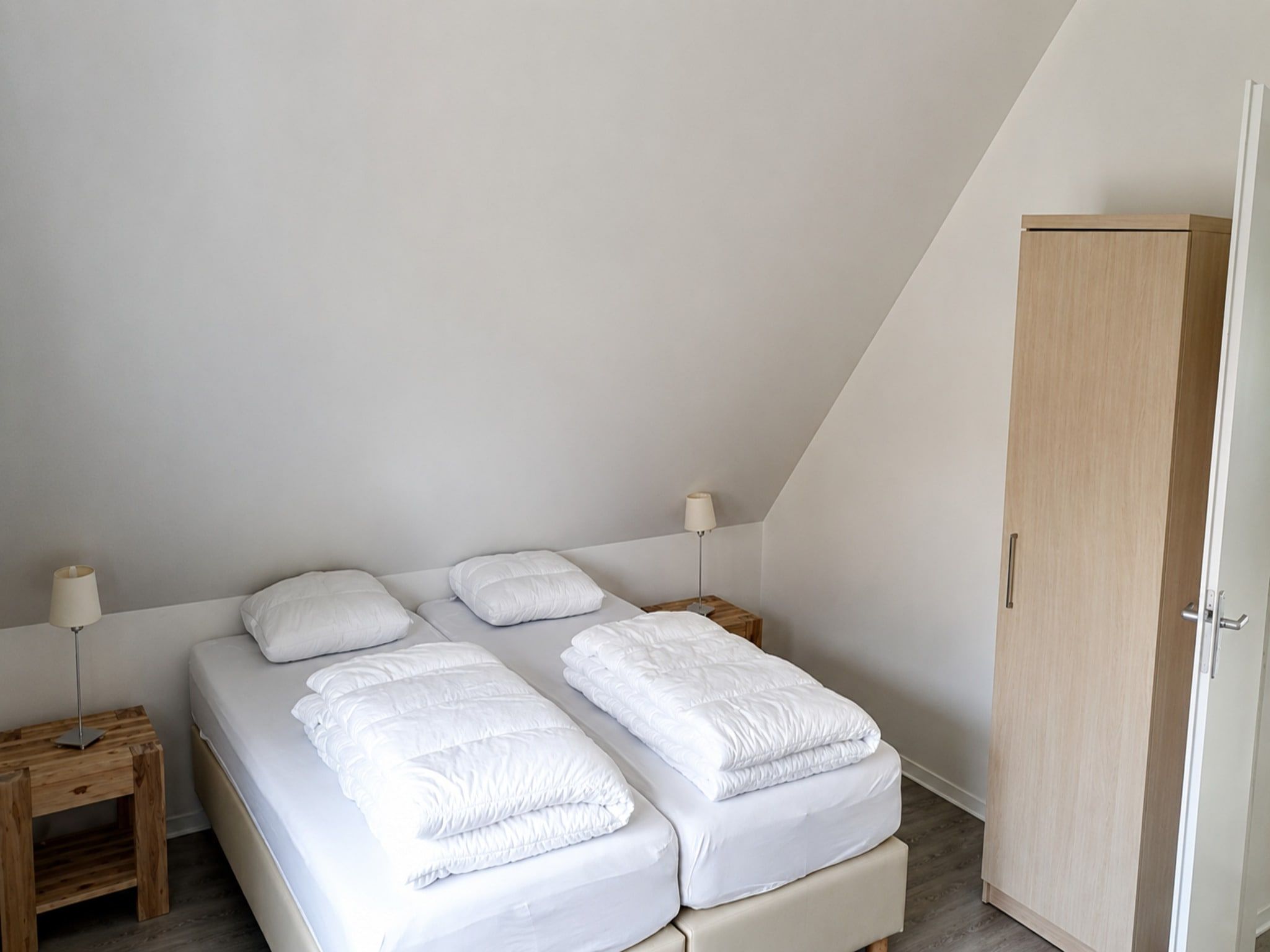 Een slaapkamer van Landgoed de Lente 30 Tulp Breskens in Breskens