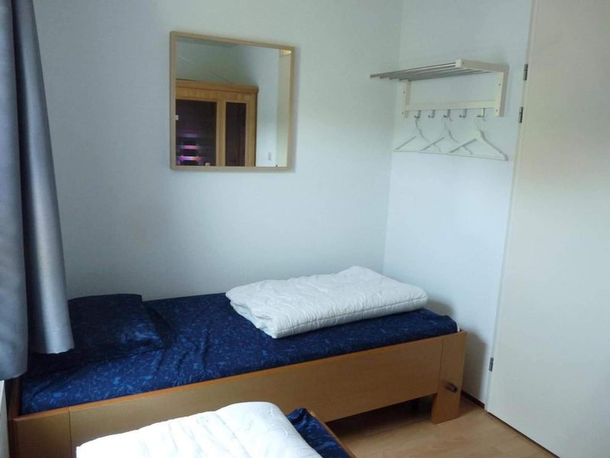 Een slaapkamer van Schoneveld 246 Stern Breskens in Breskens