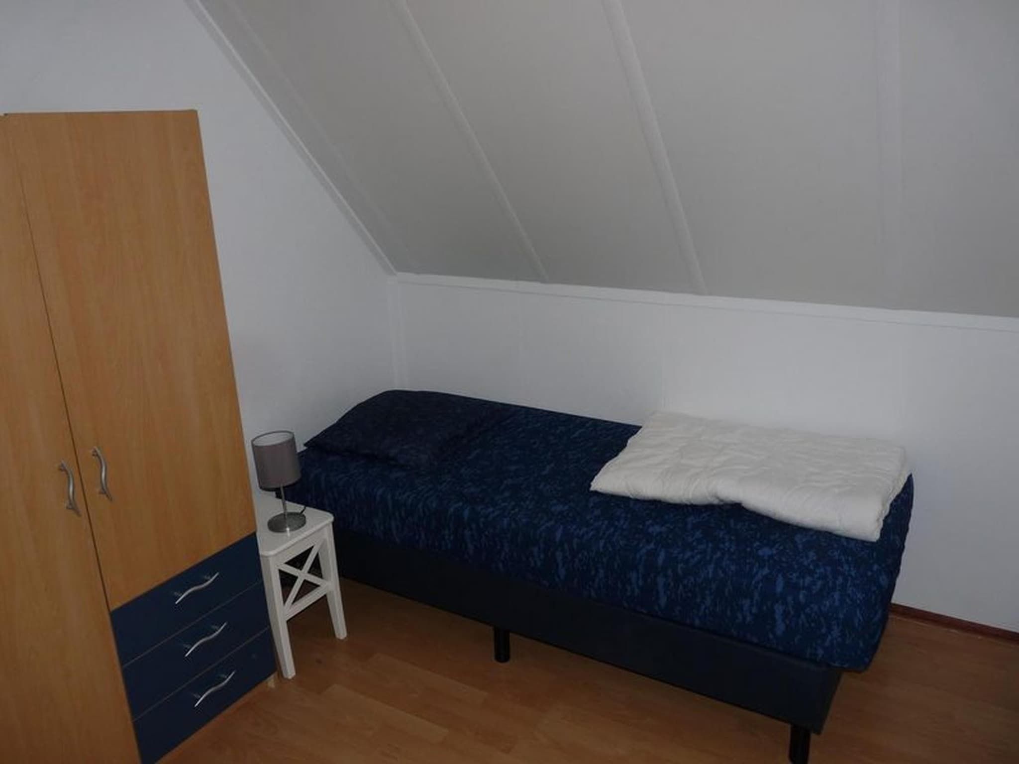 Een slaapkamer van Schoneveld 246 Stern Breskens in Breskens