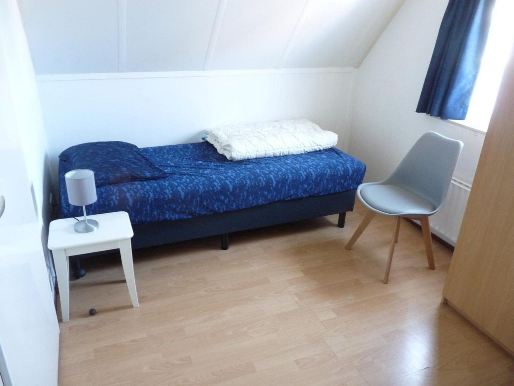 Een slaapkamer van Schoneveld 246 Stern Breskens in Breskens