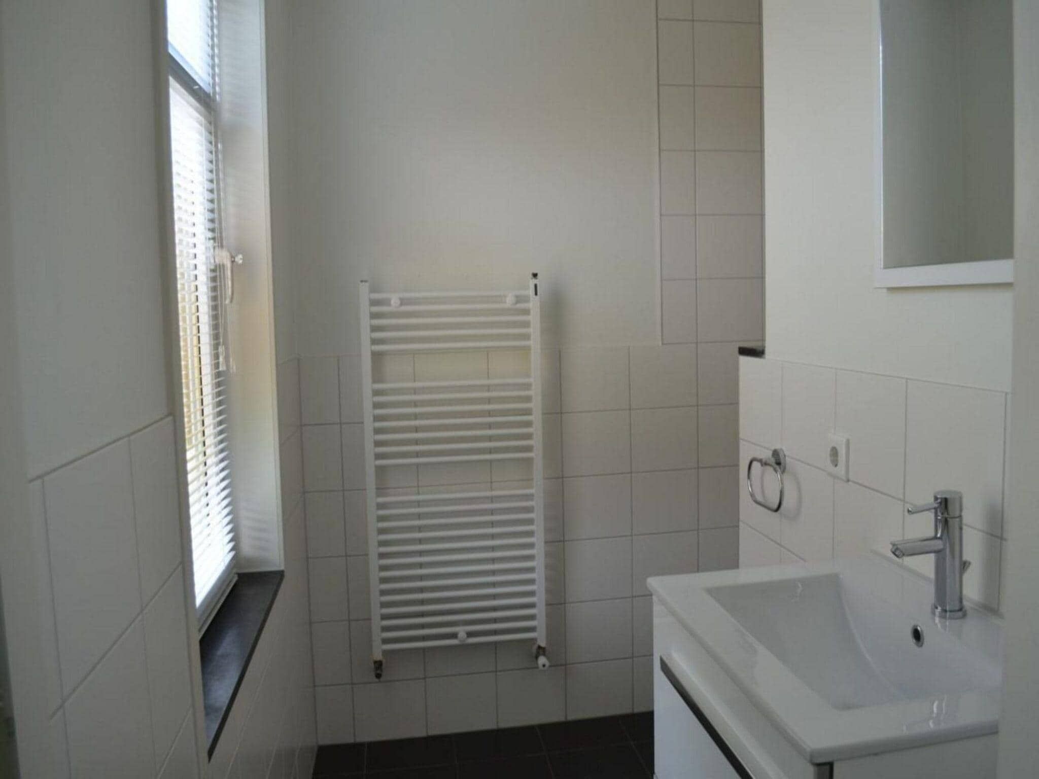 De badkamer van Landgoed de Lente 34 Krokus Breskens in Breskens