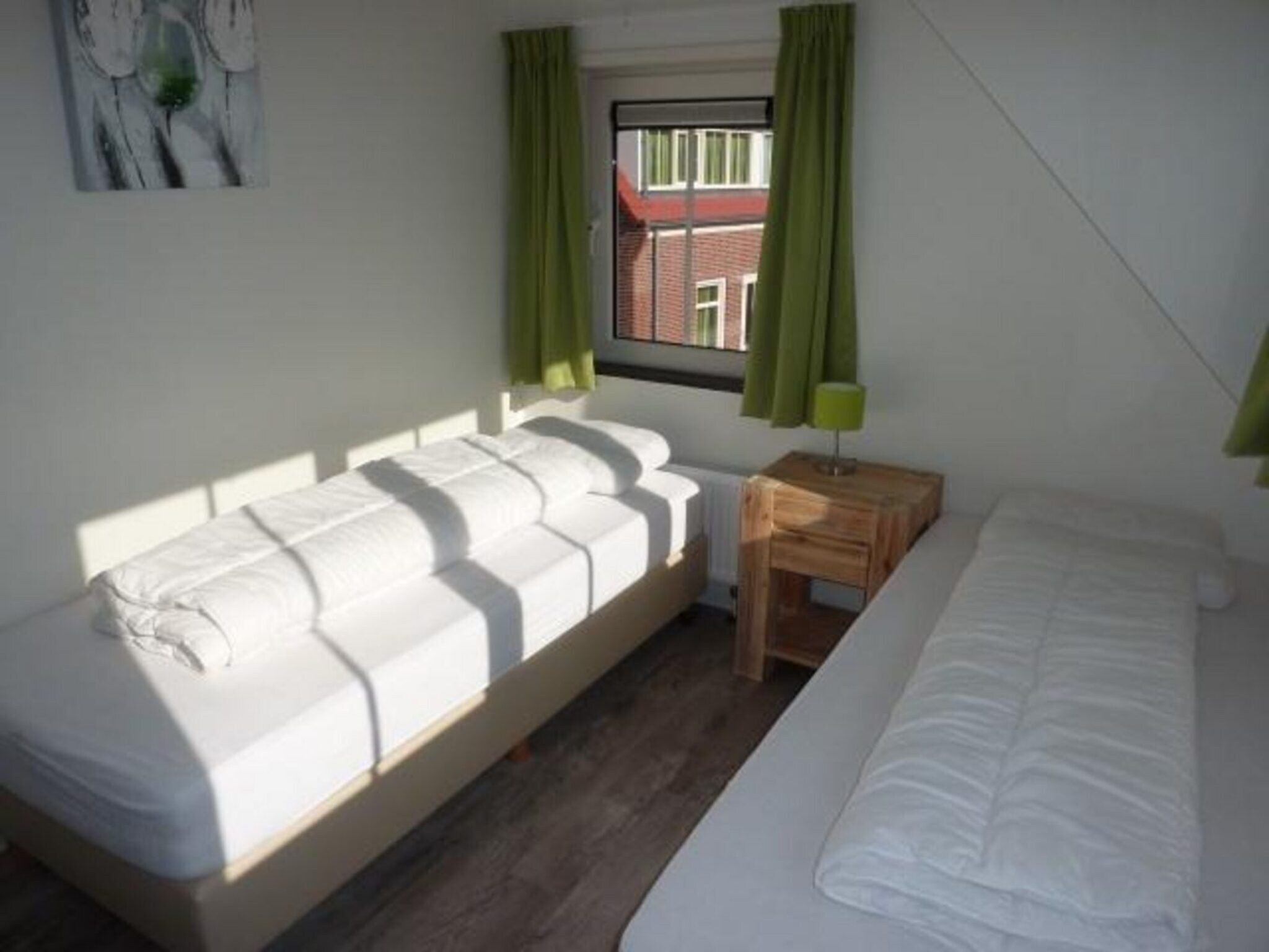 Een slaapkamer van Landgoed de Lente 36 Krokus Breskens in Breskens